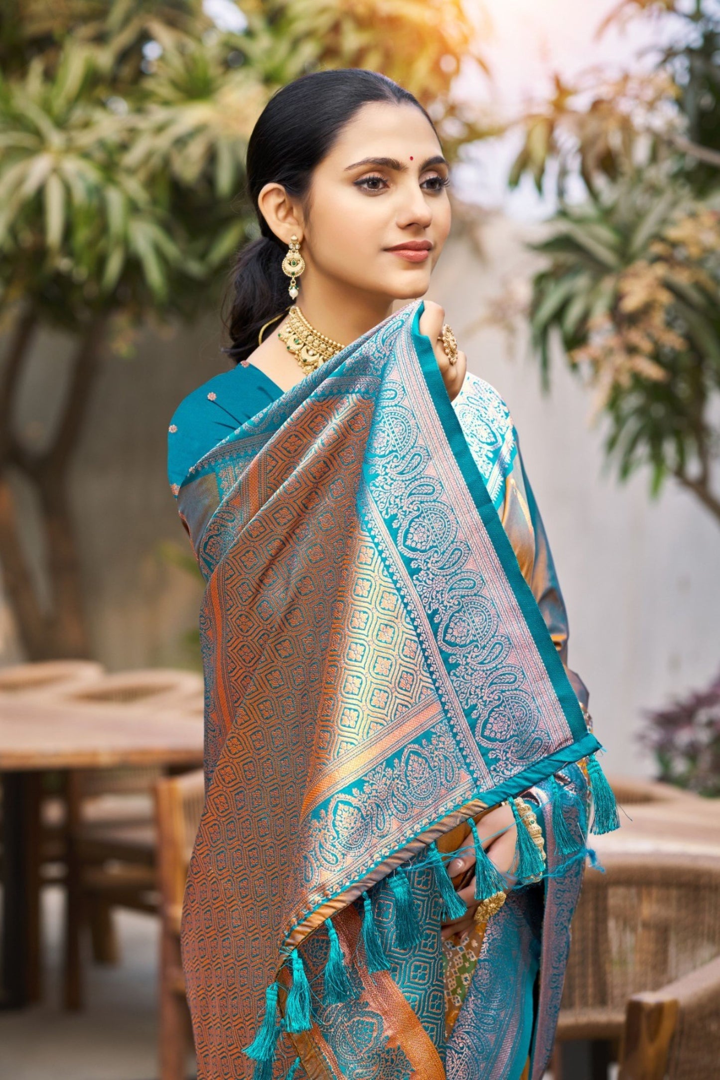 Traditional Teal Blue and Copper Silk Saree with Rich Woven Zari Border