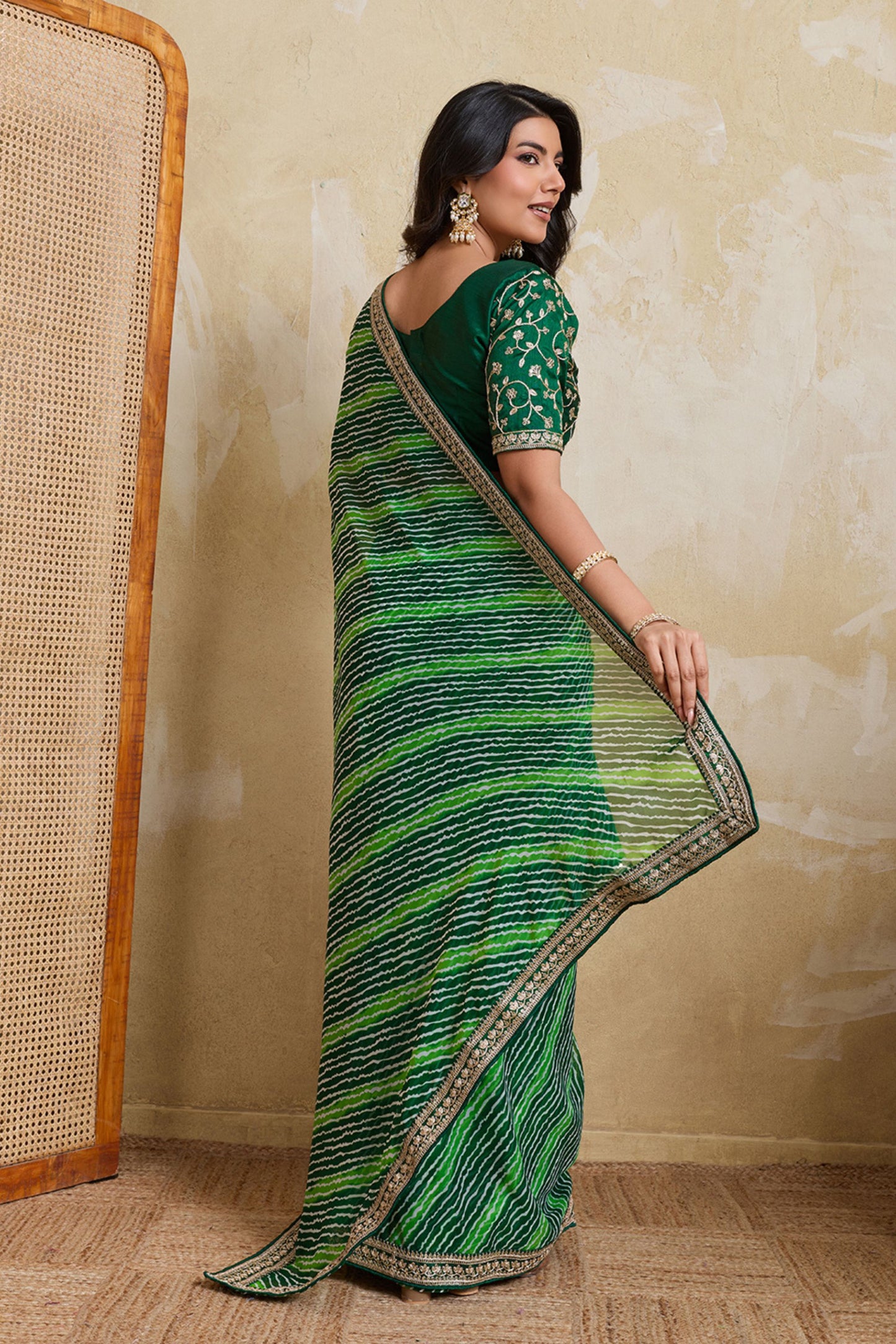 Green Georgette Saree with Golden Embroidered Border Designer Blouse