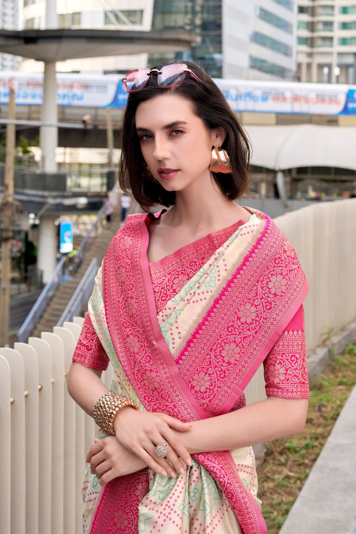 Cream And Pink Patola Print Saree with Intricate Border Festive Wear