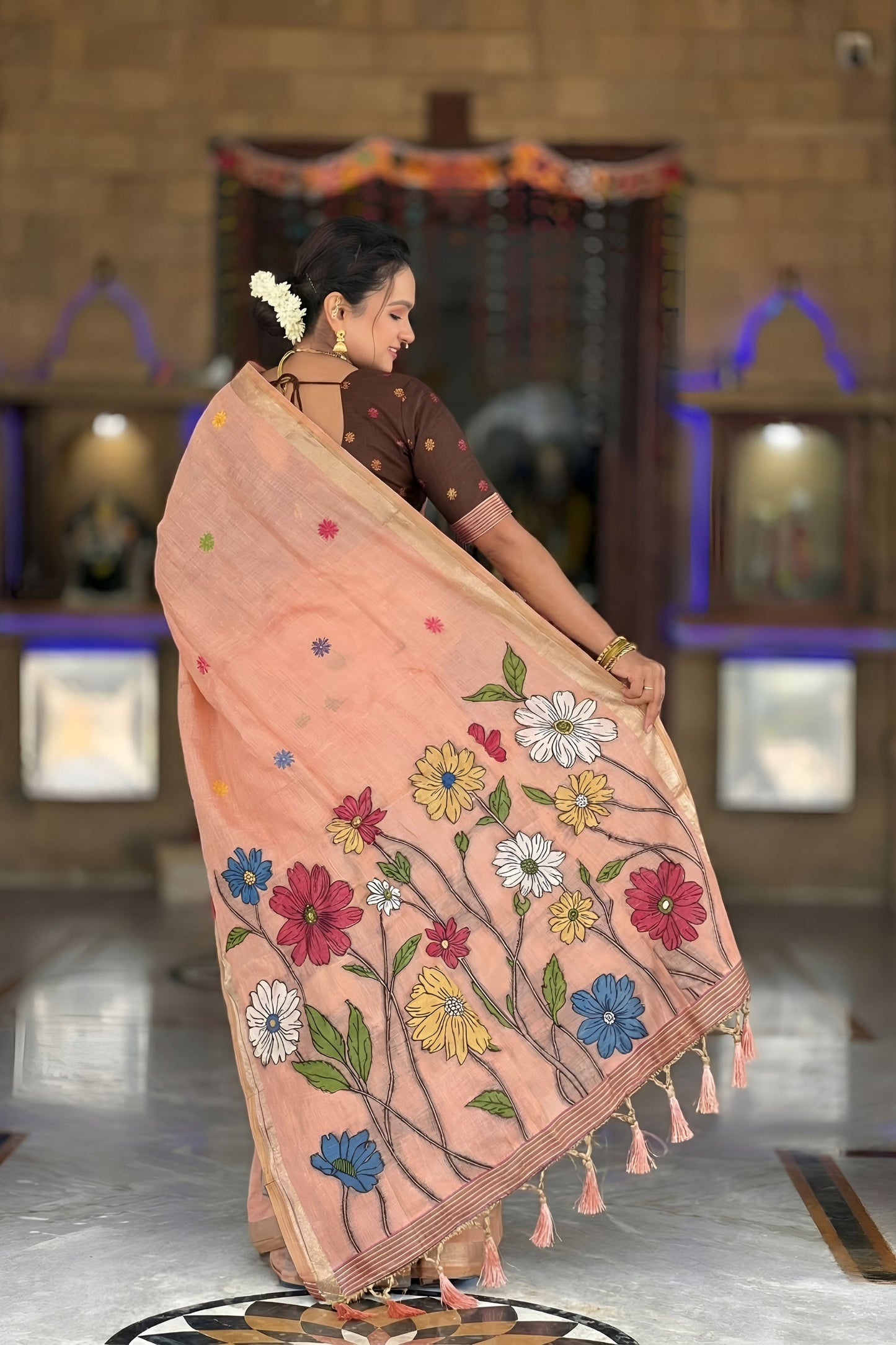 Peach Linen Silk Saree with Multicolor Floral Print Woven Border
