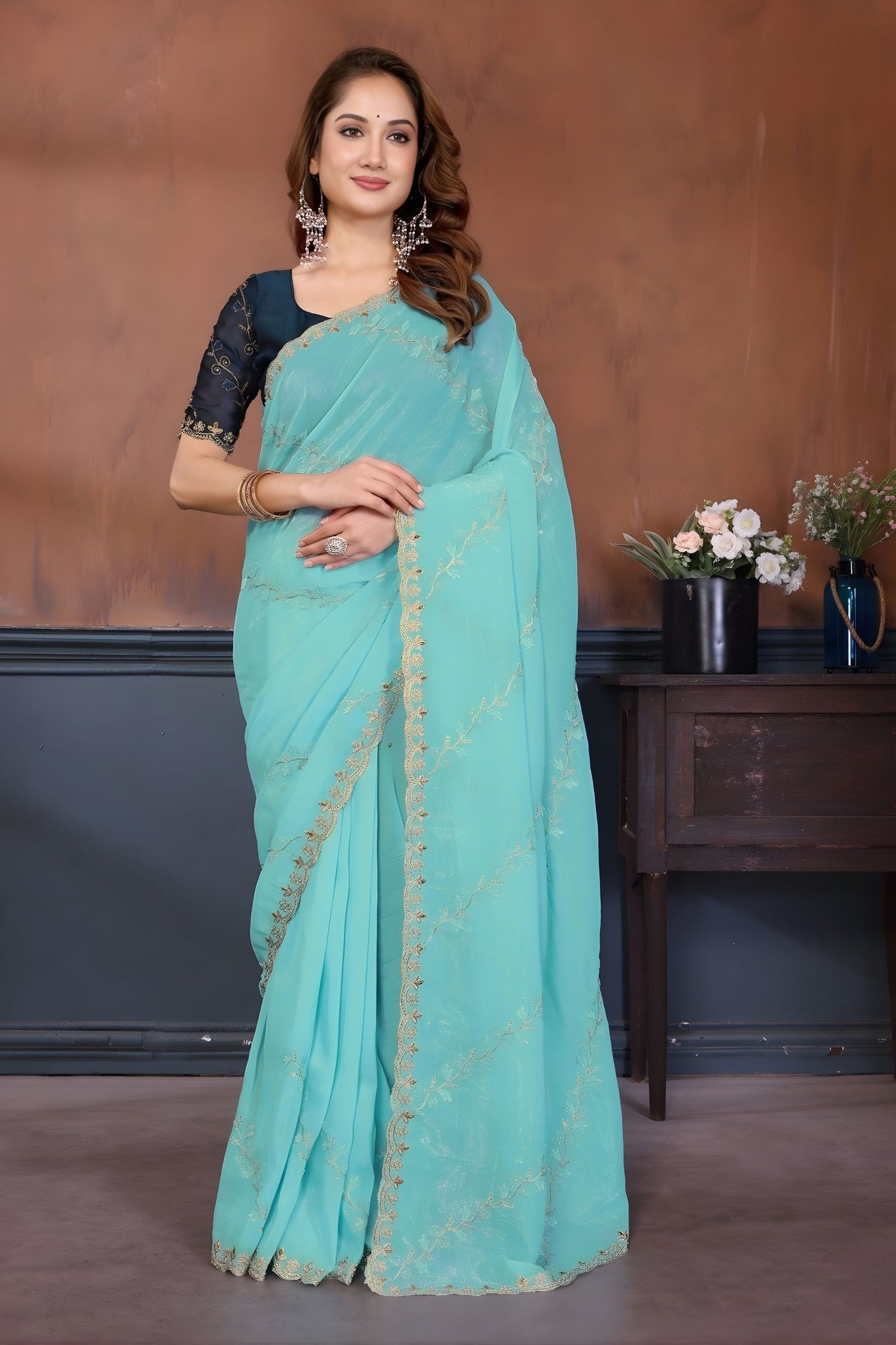 Sea Green Georgette Designer Saree with Gold Embroidered Border