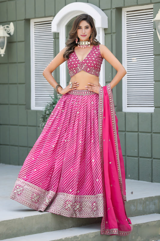 Vibrant Pink Art Silk Lehenga Choli with Heavy Embroidered Border and Matching Dupatta