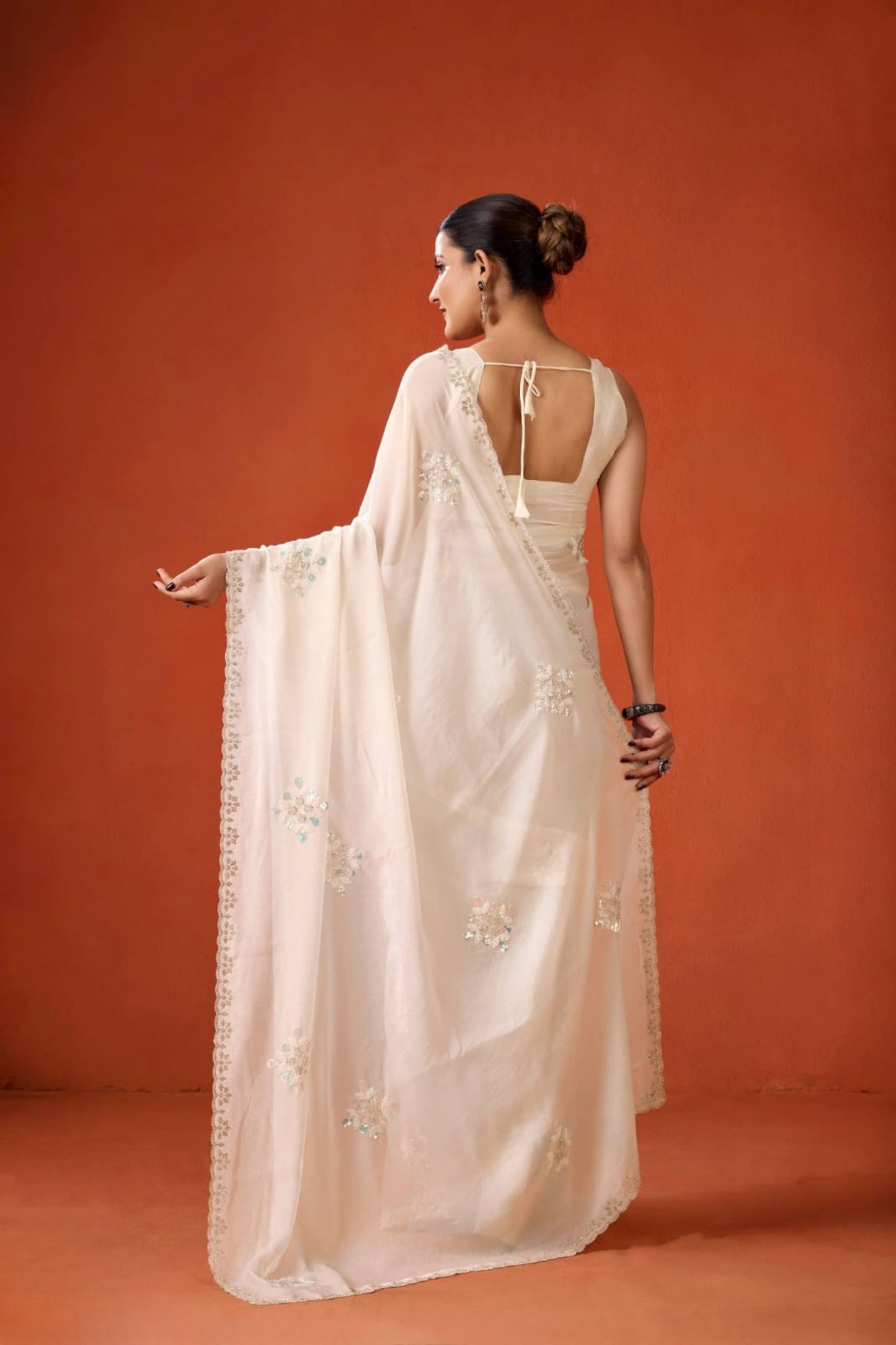 Cream Embroidered Georgette Saree Floral Motifs Designer Border