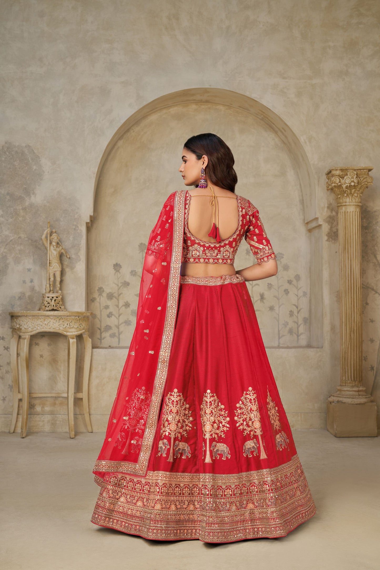 Graceful Red Silk Embroidered Lehenga Choli with Elephant Motif and Dupatta for Wedding