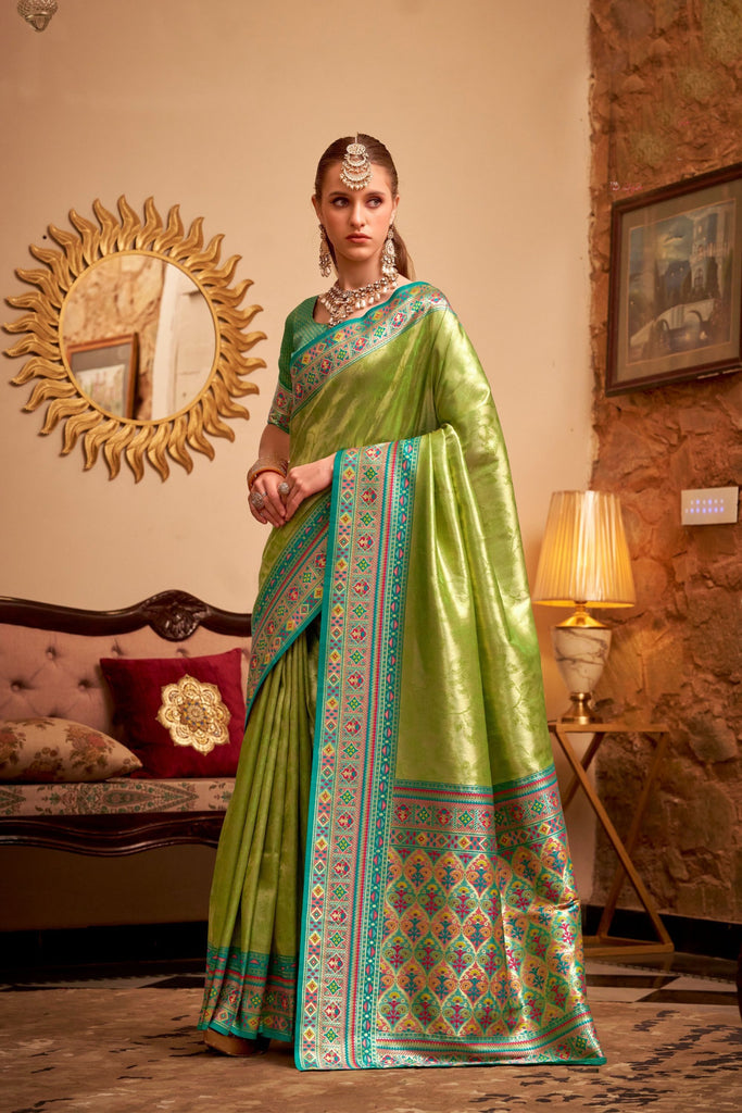 Elegant Green Banarasi Silk Saree with Blue  Pink Woven Border