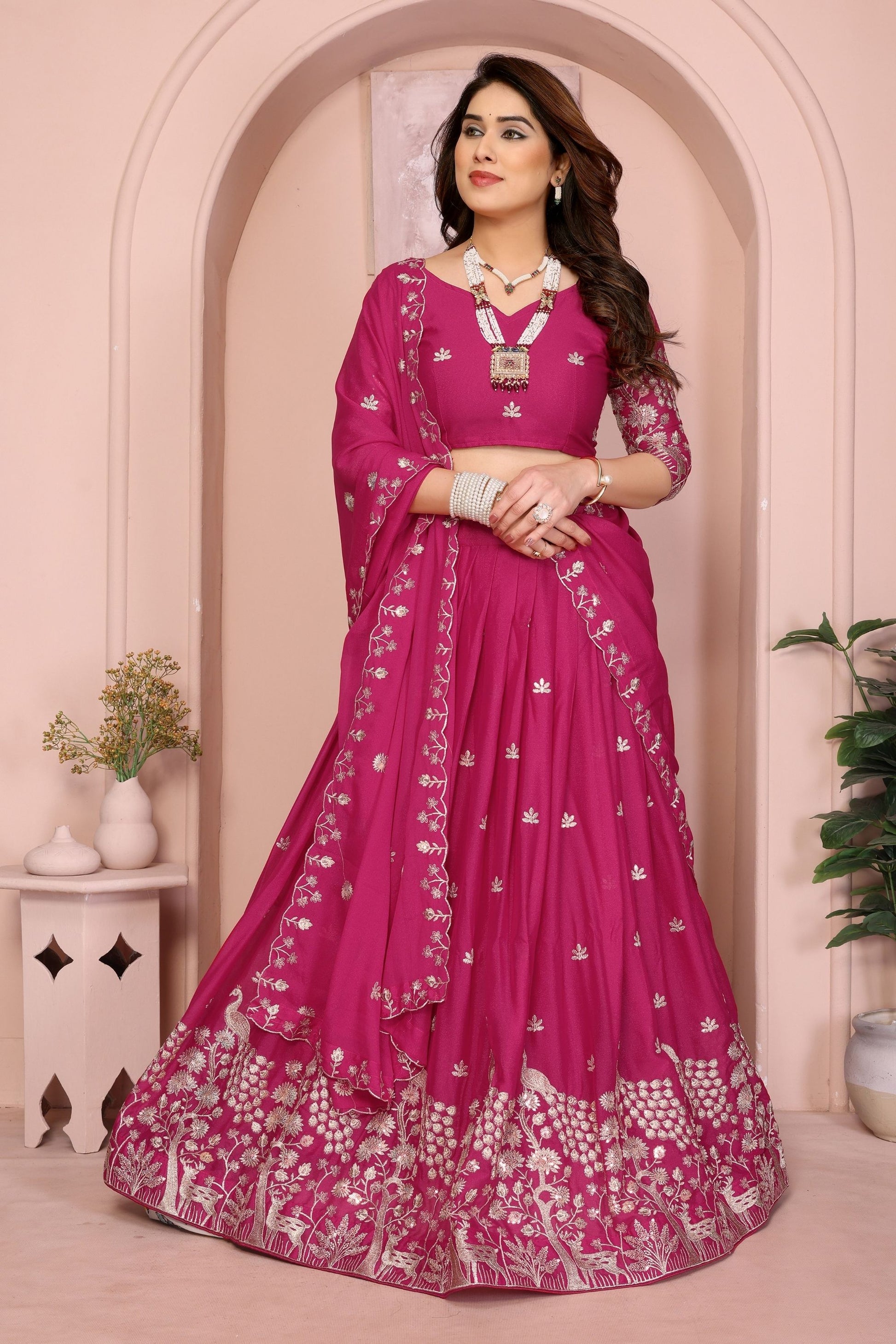 Magenta Embroidered Lehenga Choli with Silver Zari Peacock and Floral Design