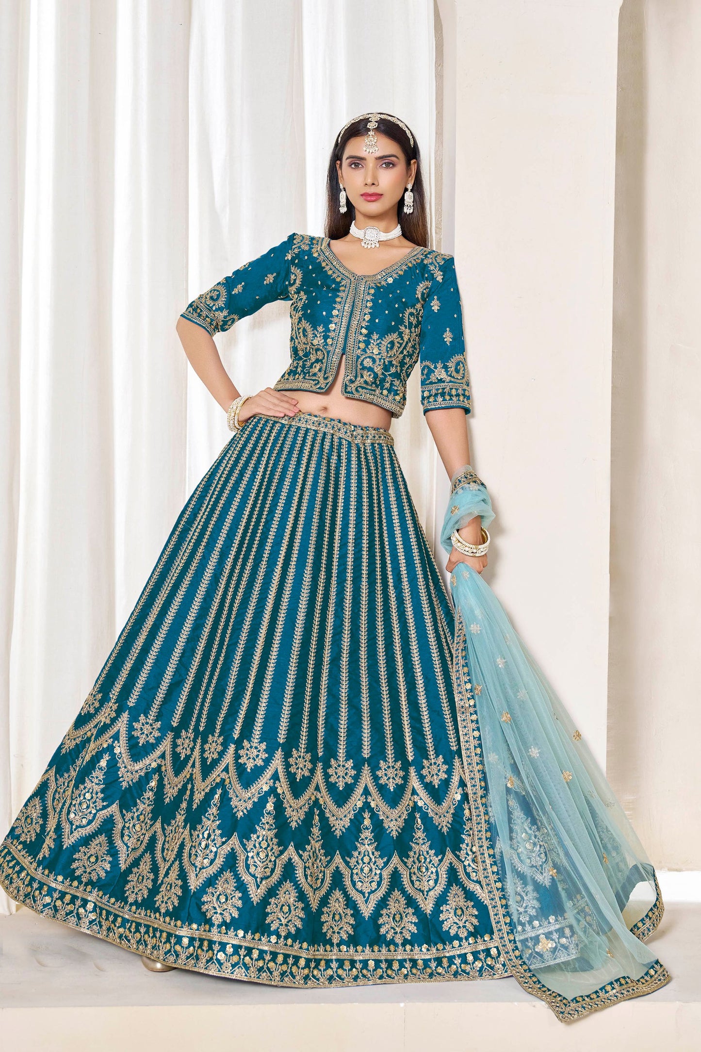 Trendy Teal Blue Art Silk Bridal Lehenga Choli with Heavy Golden Embroidery and Net Dupatta