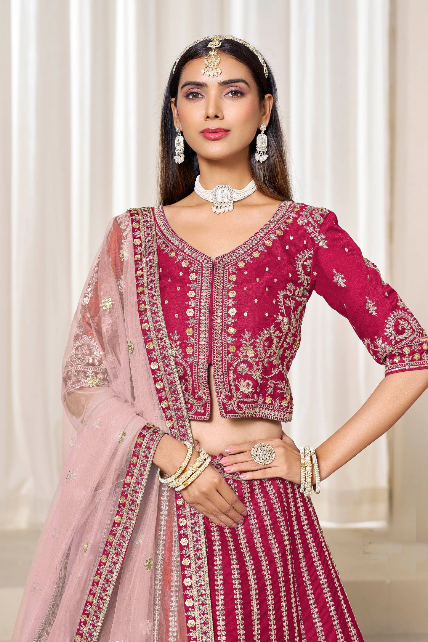 Superb Rani Pink Art Silk Bridal Lehenga Choli with Heavy Golden Embroidery and Net Dupatta