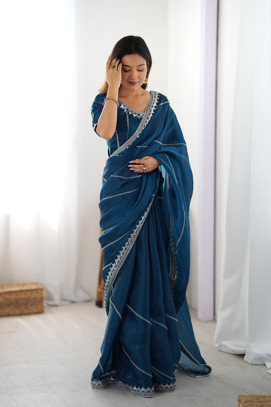 Teal Blue Designer Saree with Elegant Silver Embroidered Border