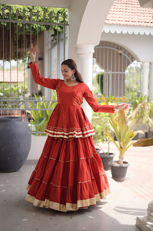 Impressive Rust Orange Cotton Designer Lehenga Choli with Layered Flared Skirt for Navratri