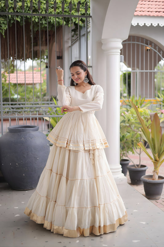 Charming Off White Cotton Designer Lehenga Choli with Layered Flared Skirt for Navratri