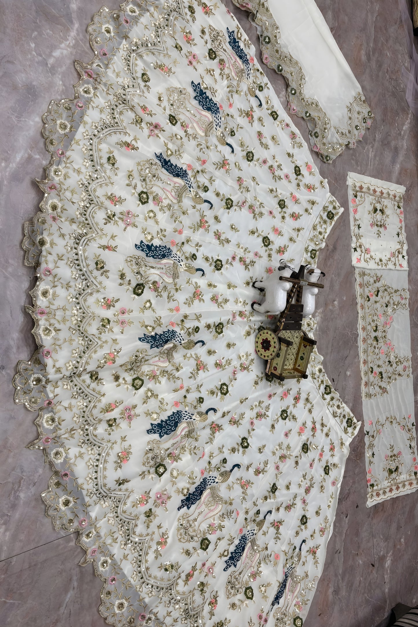 Luxury Off White Net Embroidered Lehenga Choli with Peacock Floral Thread Work and Matching Dupatta