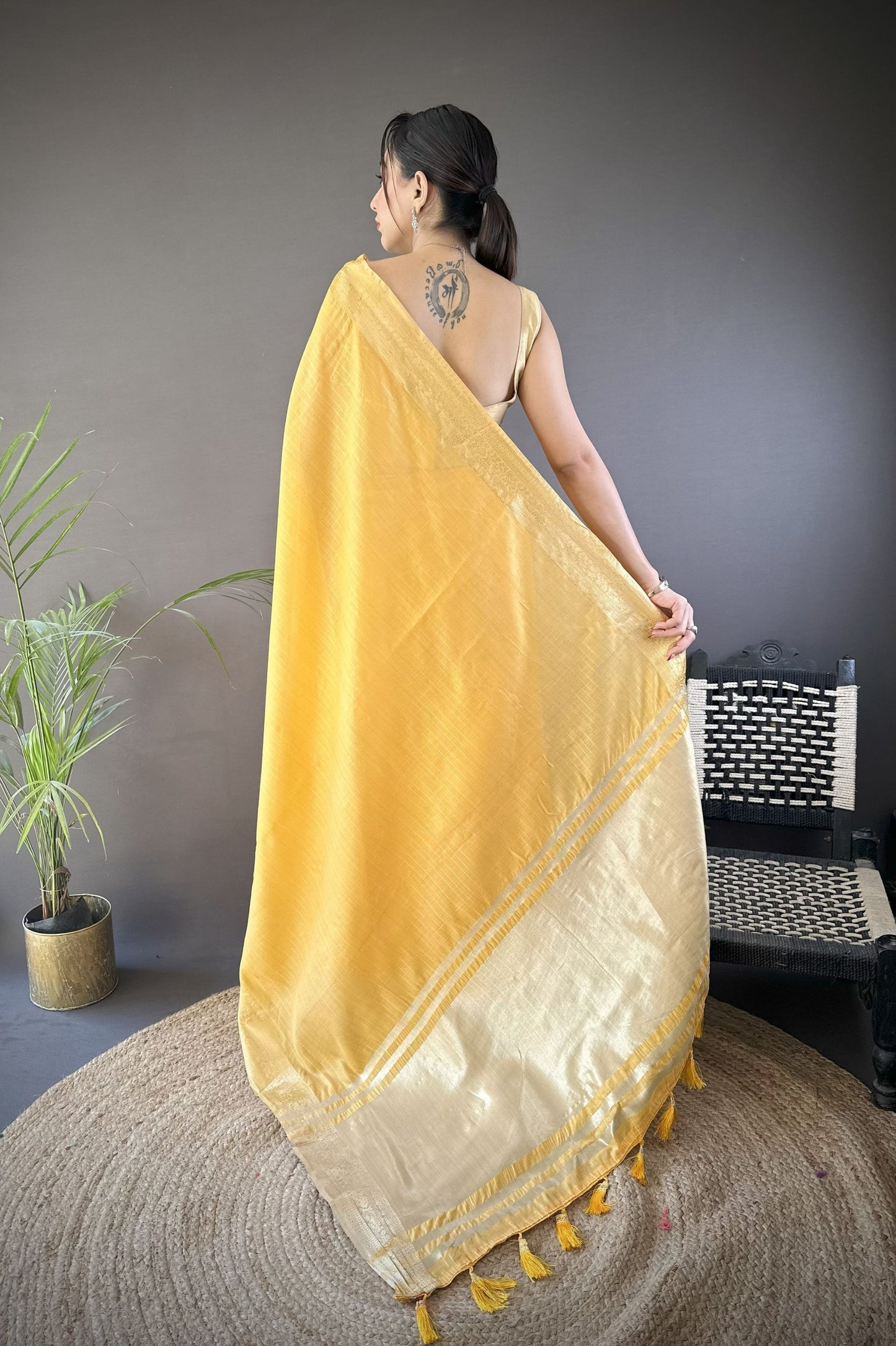 Mustard Yellow Linen Silk Saree with Golden Zari Border Tassel Pallu