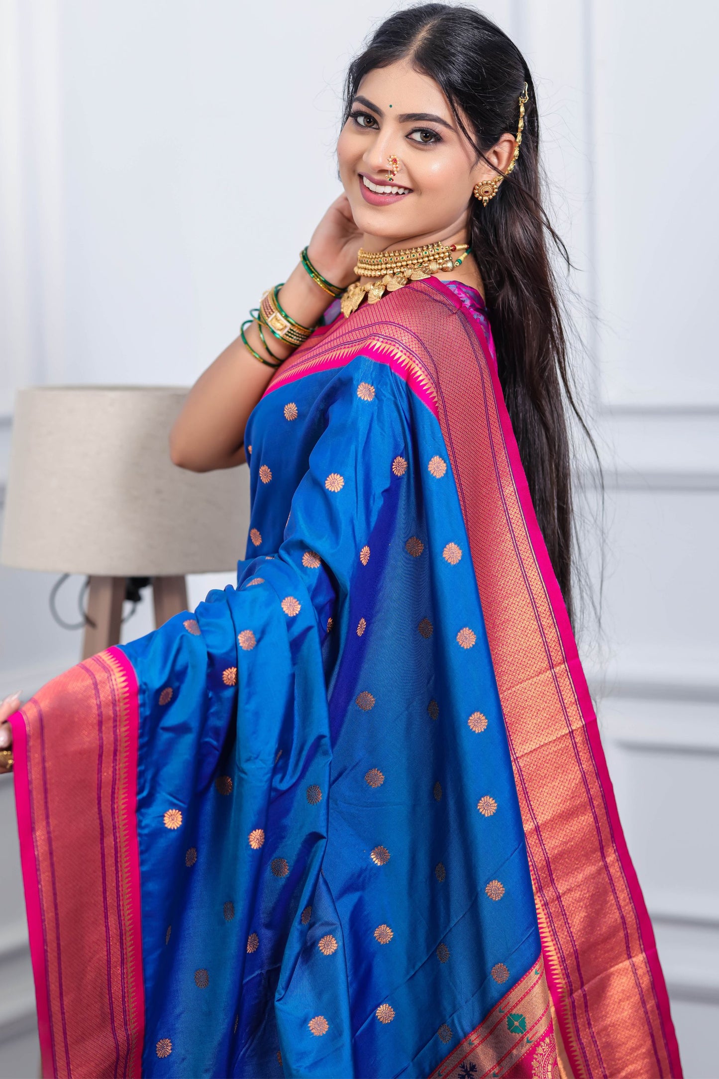 Royal Blue Kanjivaram Silk Saree with Pink Border Gold Zari Butti Work