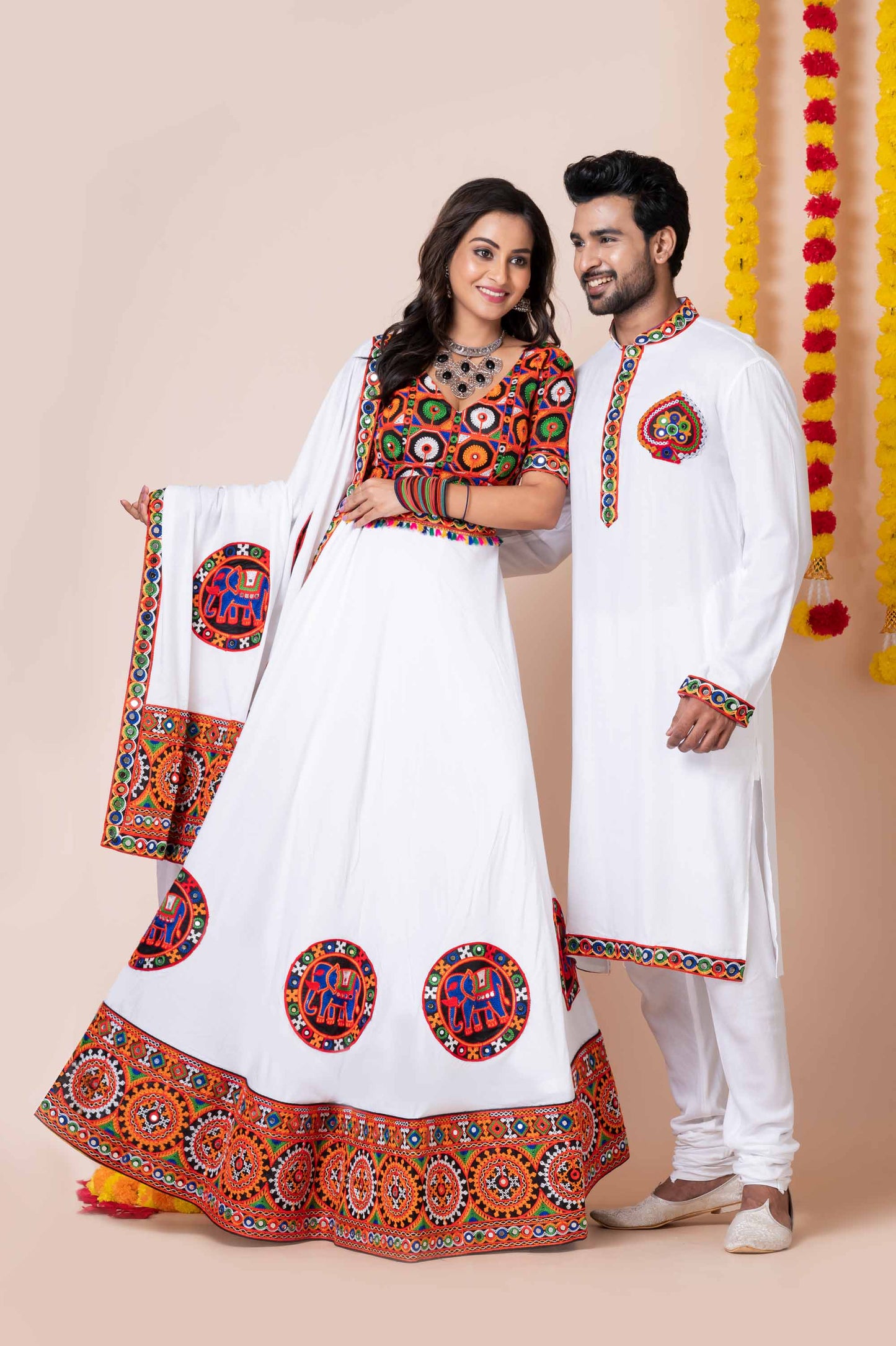 White Rayon Couple Navratri Outfit with Multicolor Kutchi Mirror and Elephant Embroidery