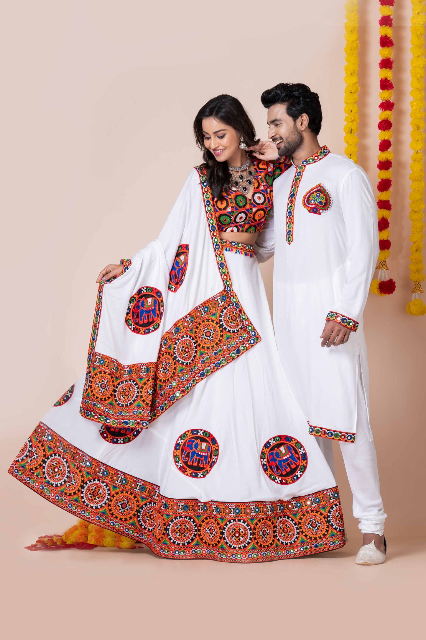 White Rayon Couple Navratri Outfit with Multicolor Kutchi Mirror and Elephant Embroidery