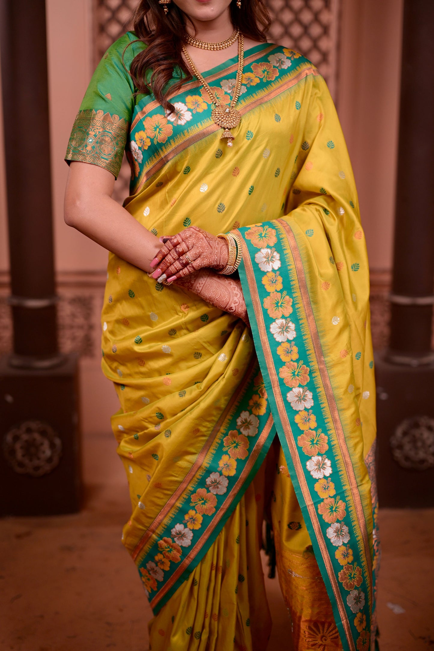Yellow Silk Saree with Green Border Floral Zari Work Traditional Saree