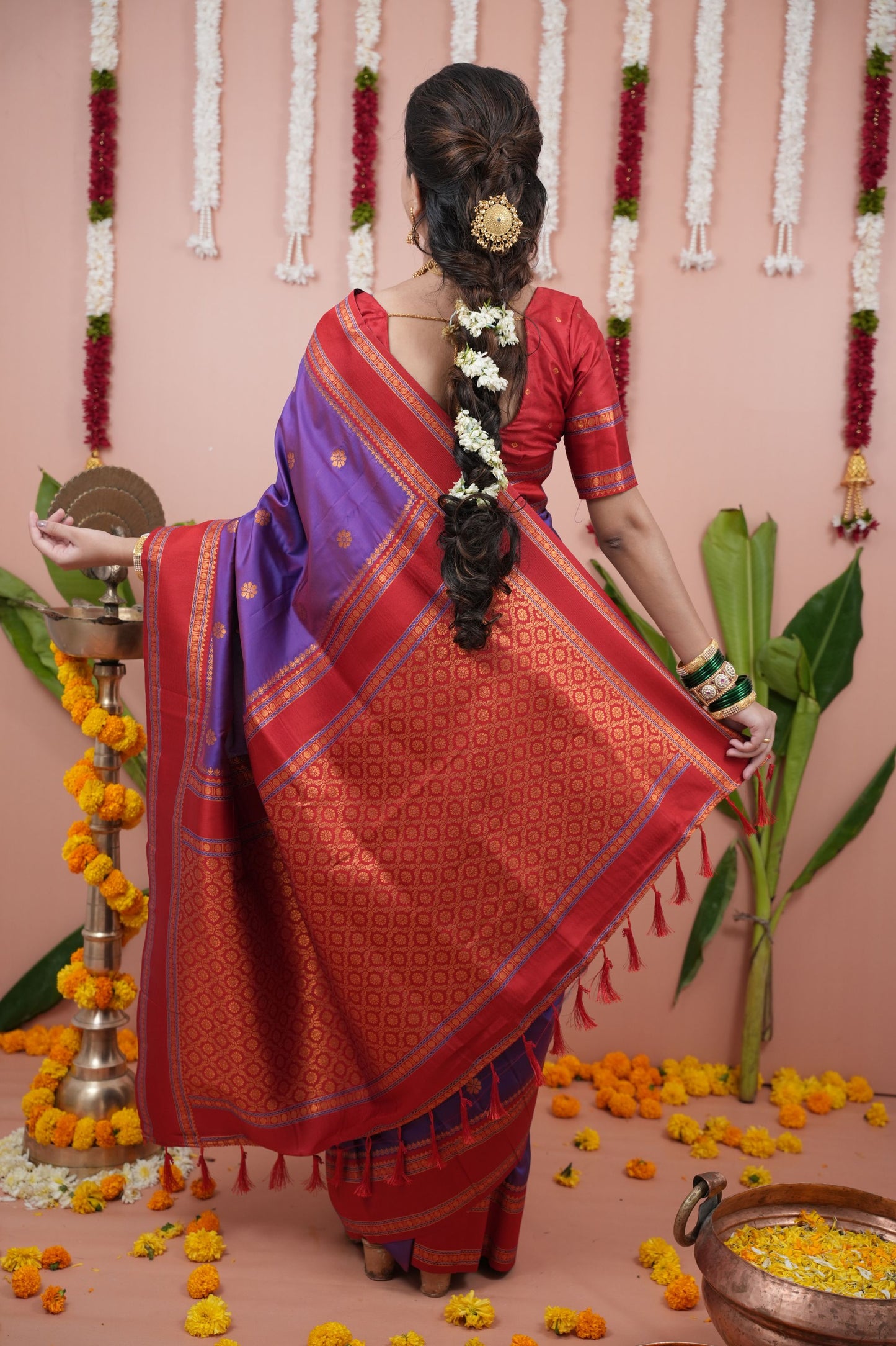 Purple Silk Saree with Red Woven Border and Traditional Design