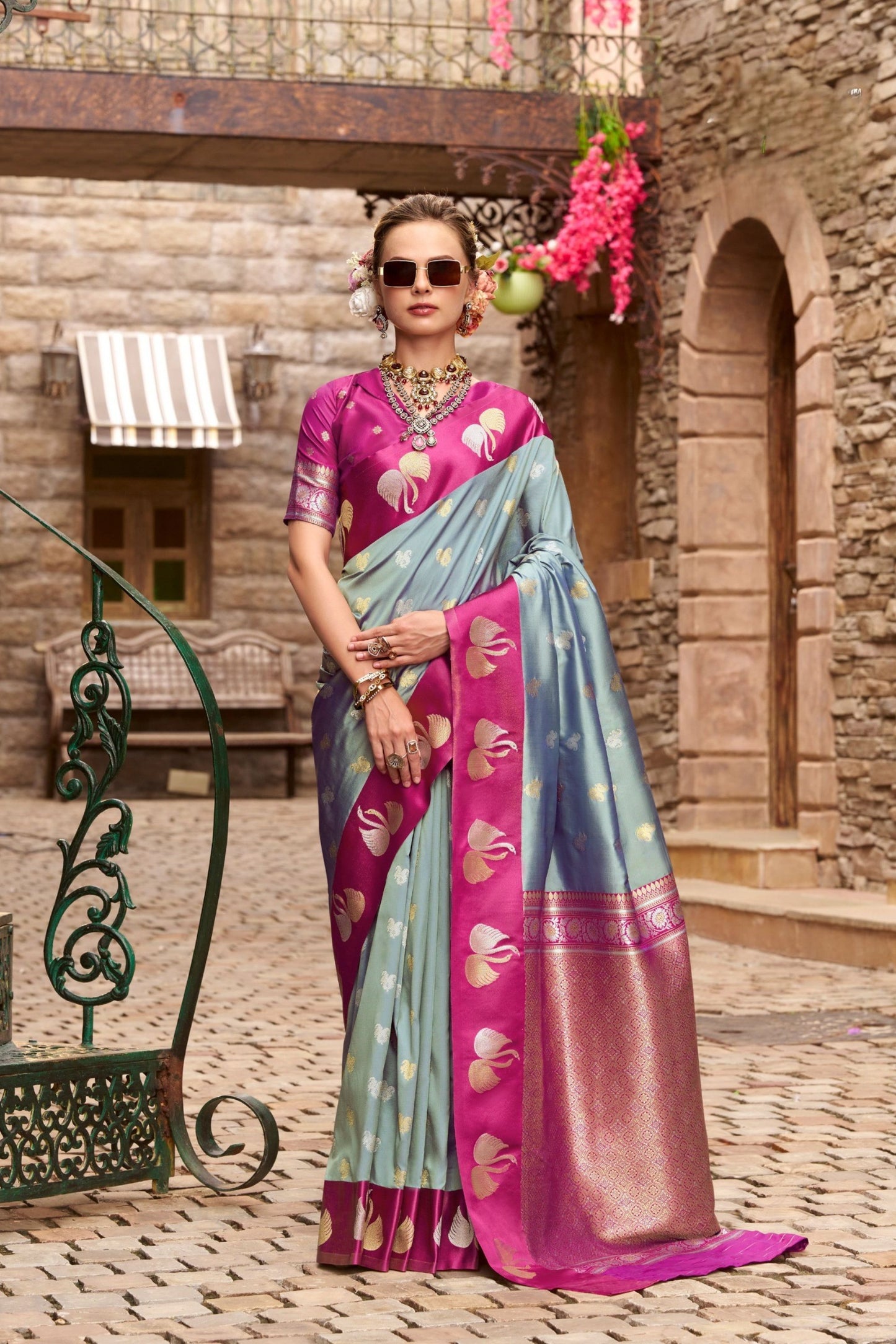Sky Blue And Magenta with Gold Zari Motifs and Rich Border