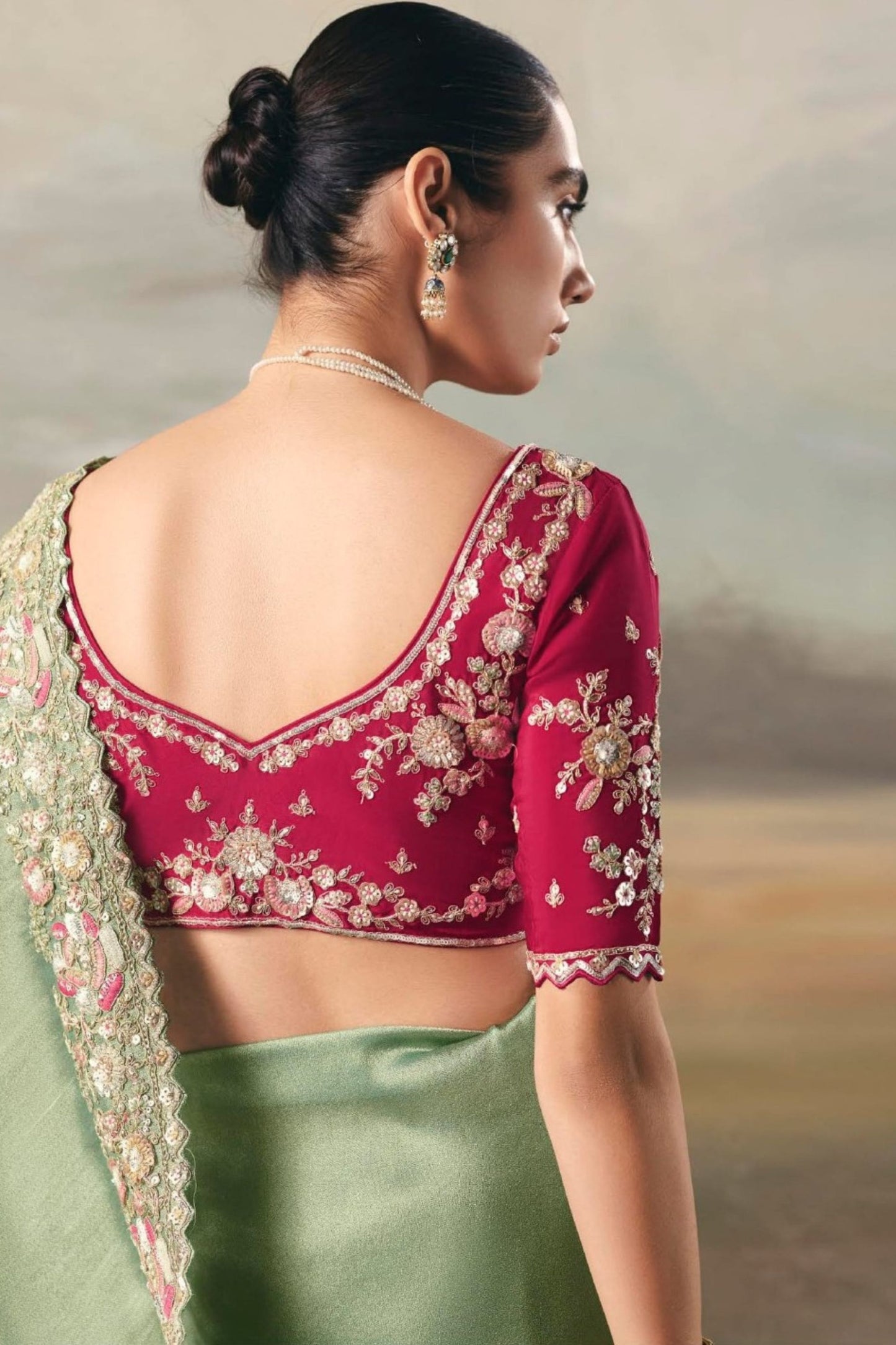 Designer Sage Green Silk Saree Contrasting Red Embroidered Blouse