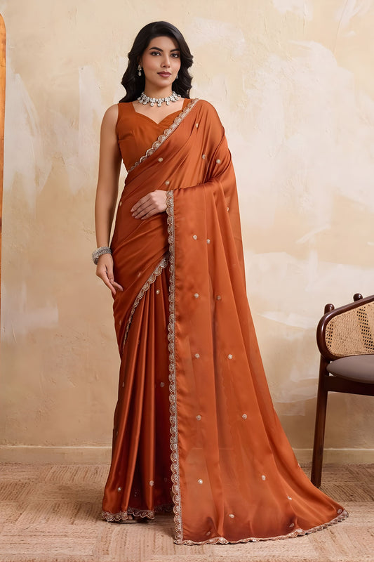 Rust Orange Georgette Saree with Silver Zari Border Butti Work