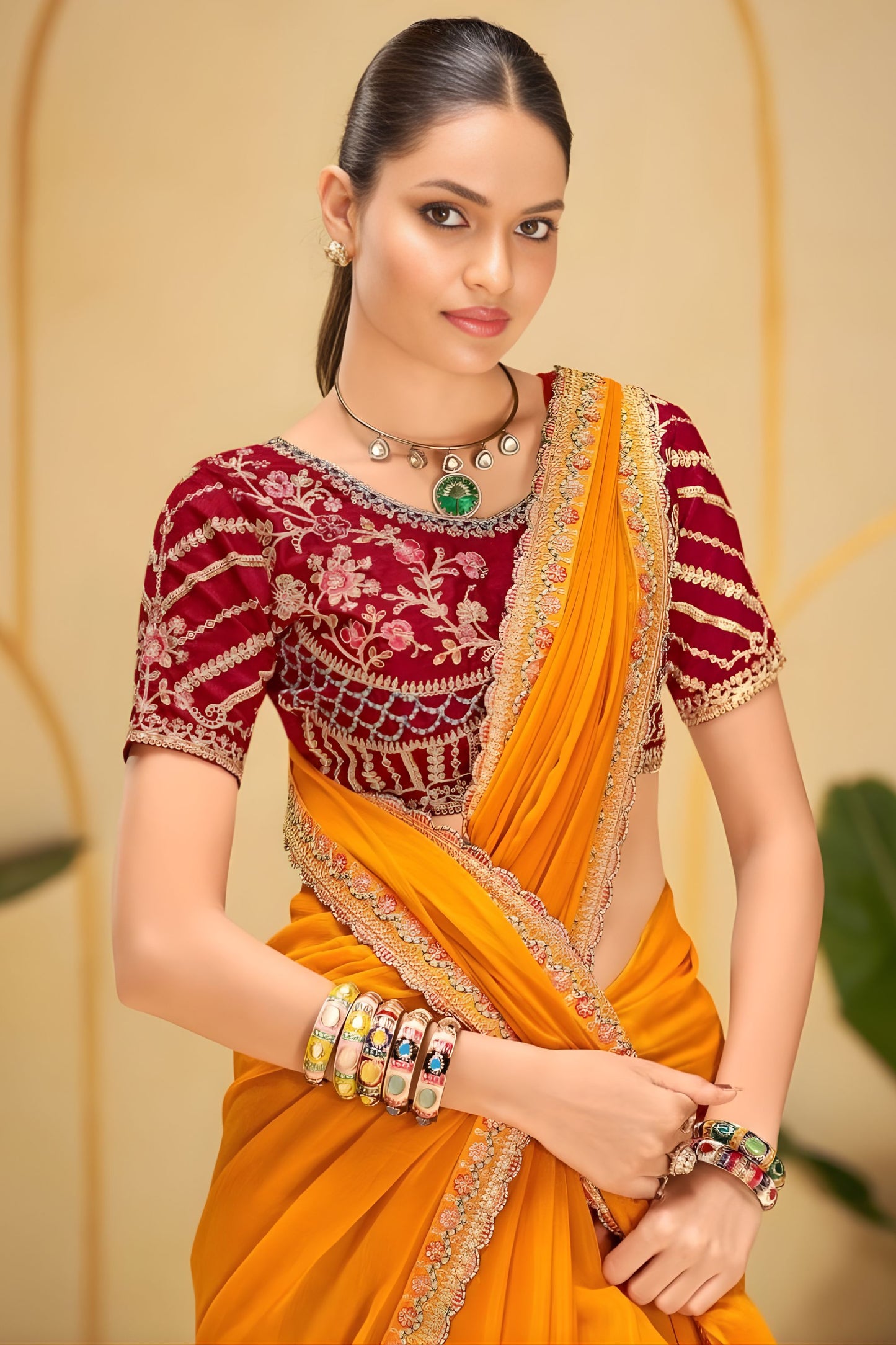 Mustard Yellow Georgette Saree with Heavy Embroidered Maroon Blouse