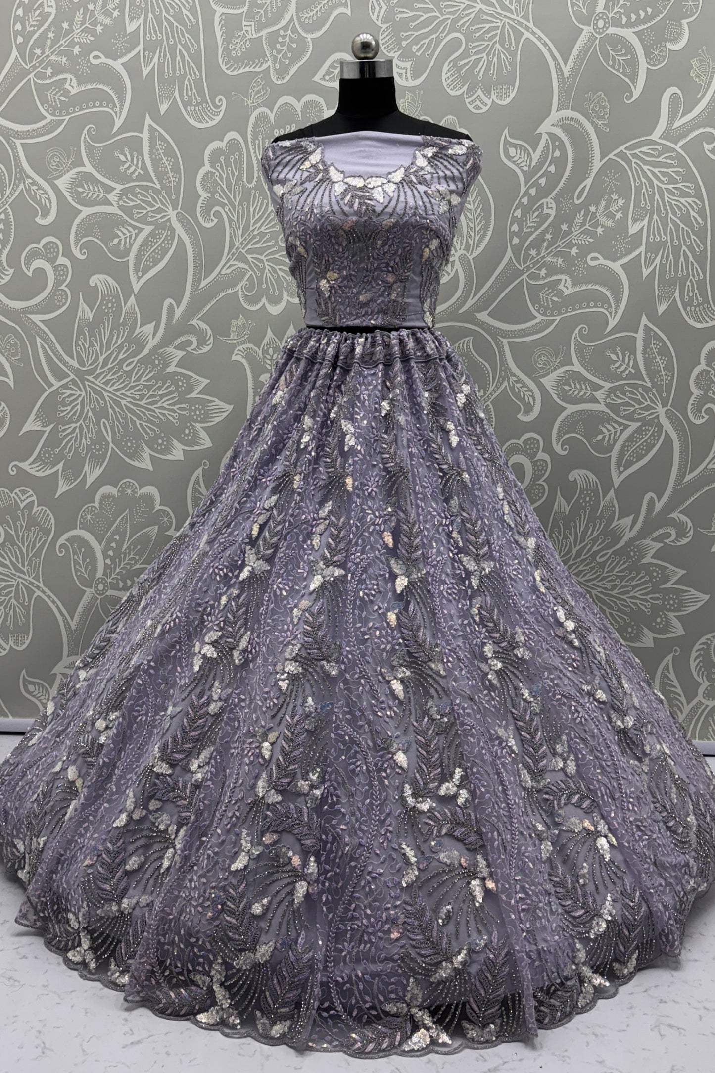 Elegant Lavender Net Bridal Lehenga Choli with Heavy Sequins and Thread Embroidery