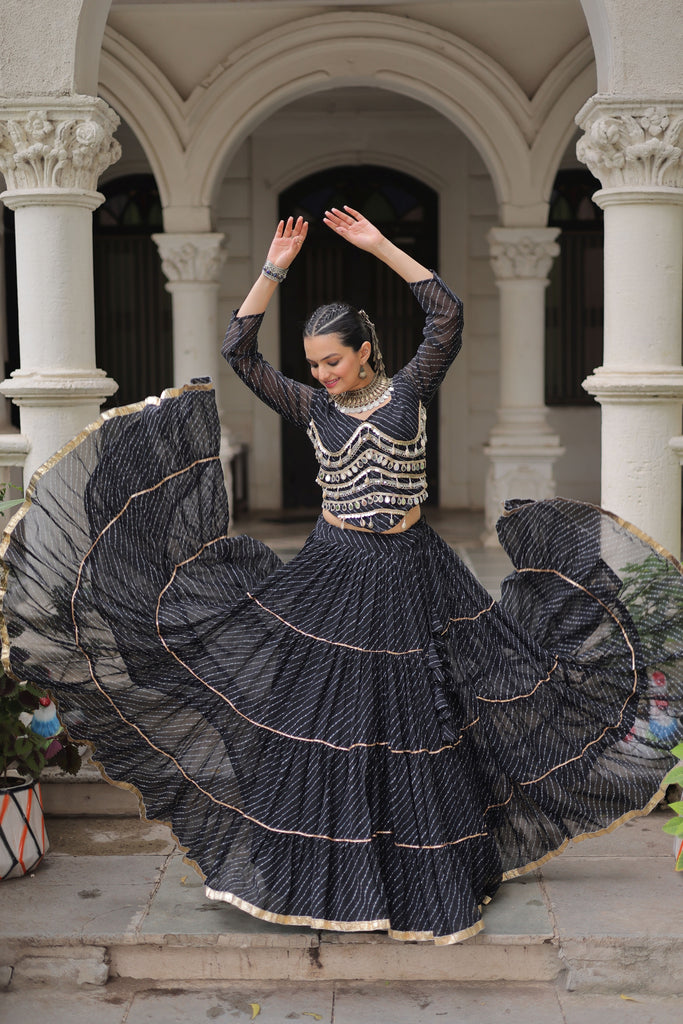 Stylish Black Bandhani Print Faux Georgette Lehenga Choli with Mirror Work