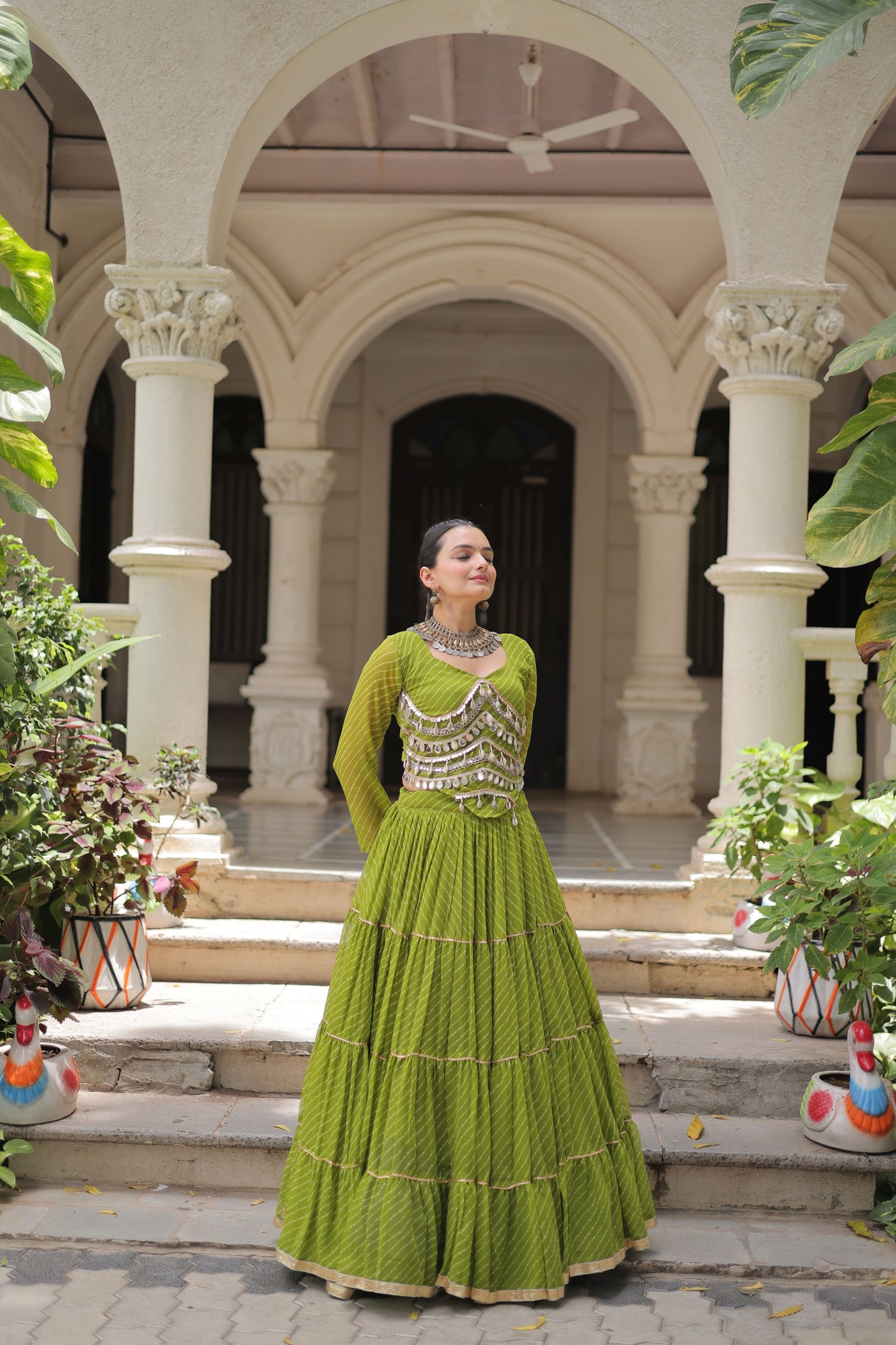 Refreshing Green Bandhani Print Faux Georgette Lehenga Choli with Mirror Work