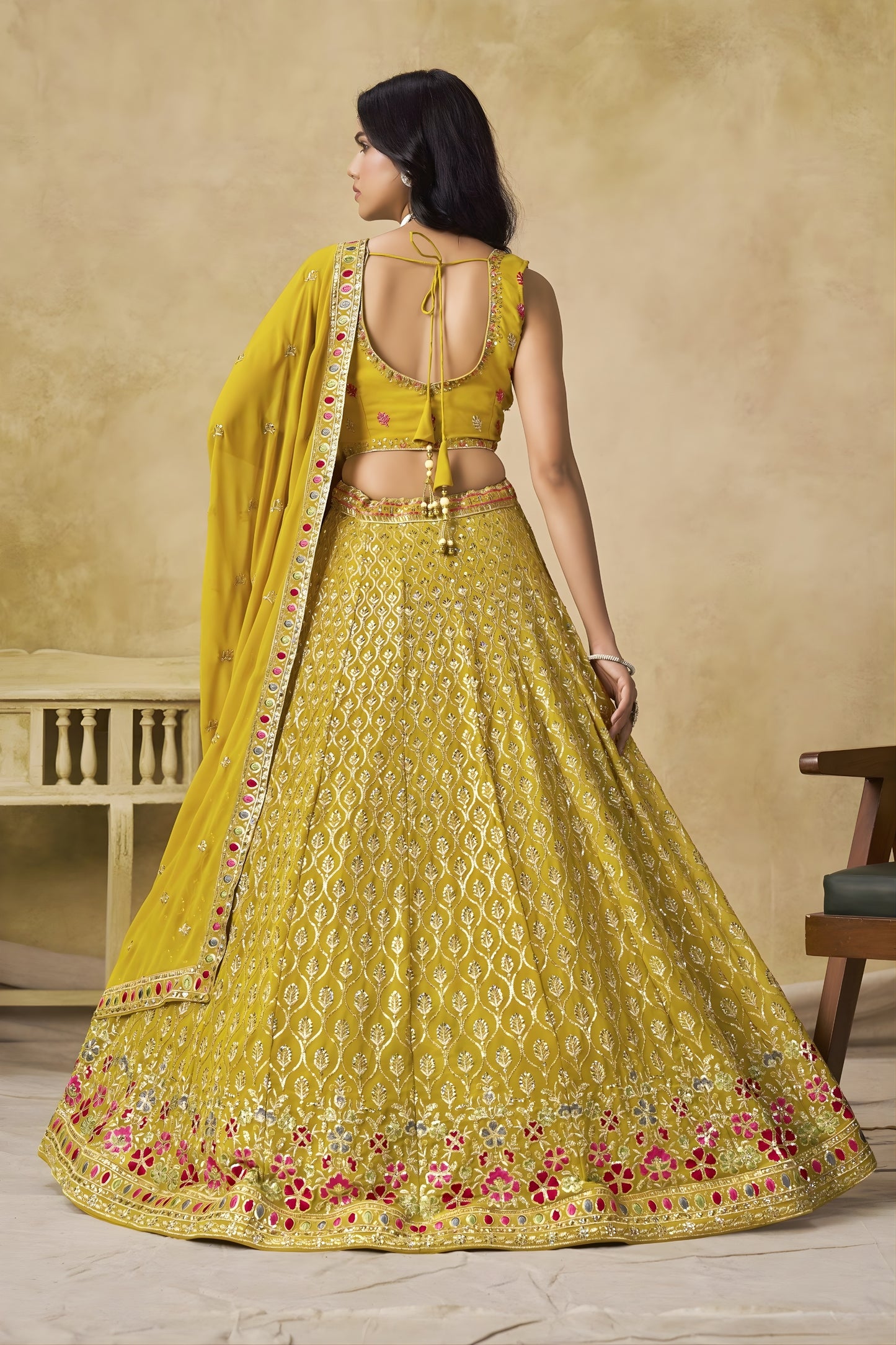 Wonderful Yellow Georgette Lehenga Choli with Floral Zari Embroidery and Matching Dupatta for Wedding