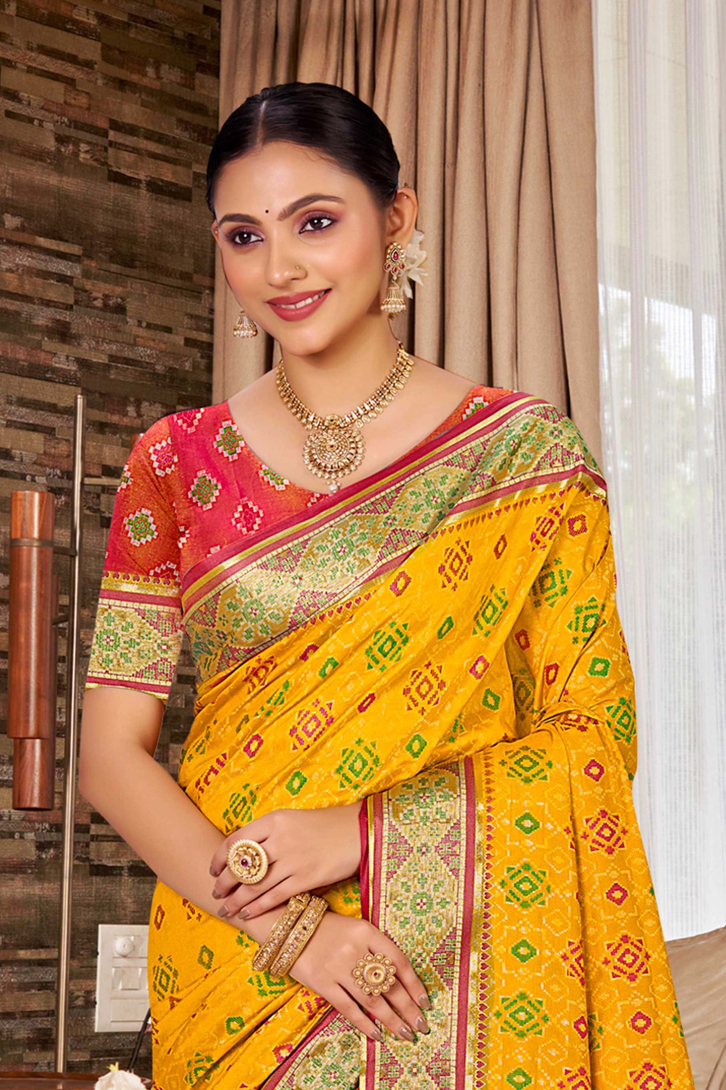 Mustard Yellow Silk Saree with Traditional Patola Contrast Red Pallu