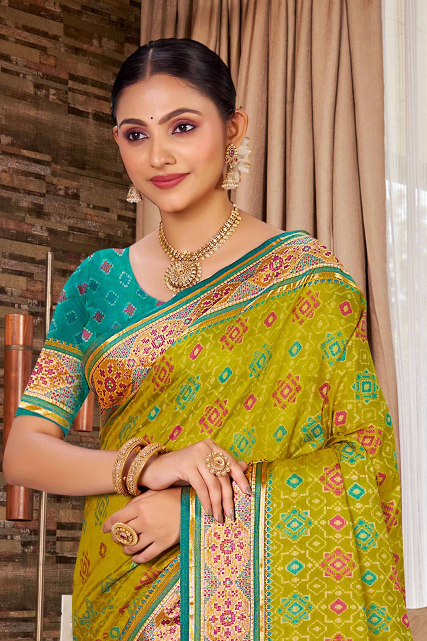 Olive Green Patola Silk Saree with Teal Border Traditional Woven Design