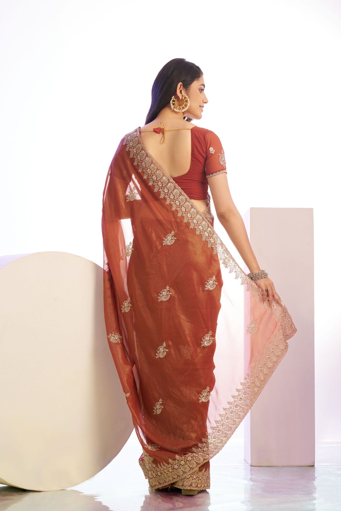 Rust Orange Embroidered Net Saree with Heavy Golden Border
