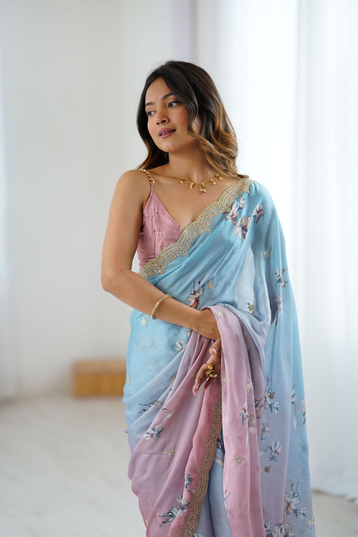 Pastel Pink Sky Blue Floral Organza Saree with Golden Lace Border