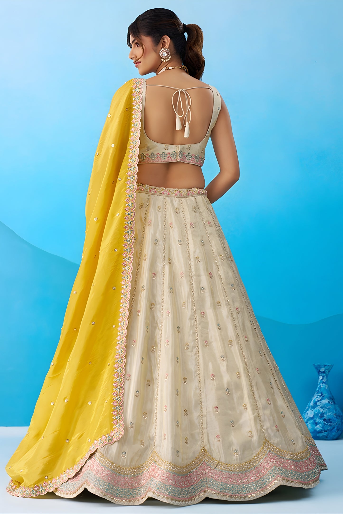 Luxury Cream Semi-Stitched Embroidered Lehenga Choli with Yellow Dupatta