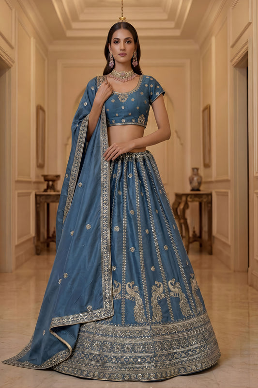 Exquisite Sky Blue Silk Embroidered Lehenga Choli with Peacock Motif Border and Designer Dupatta