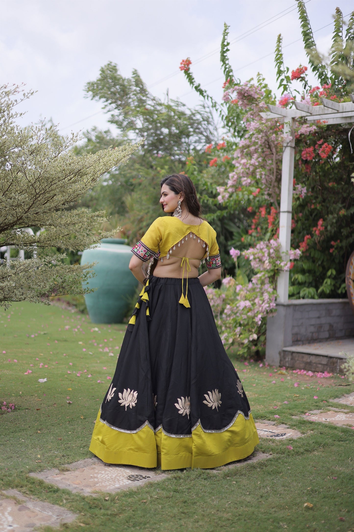 Traditional Black and Yellow Roman Silk Navratri Lehenga Choli with Kutchi Gamthi Embroidery Work
