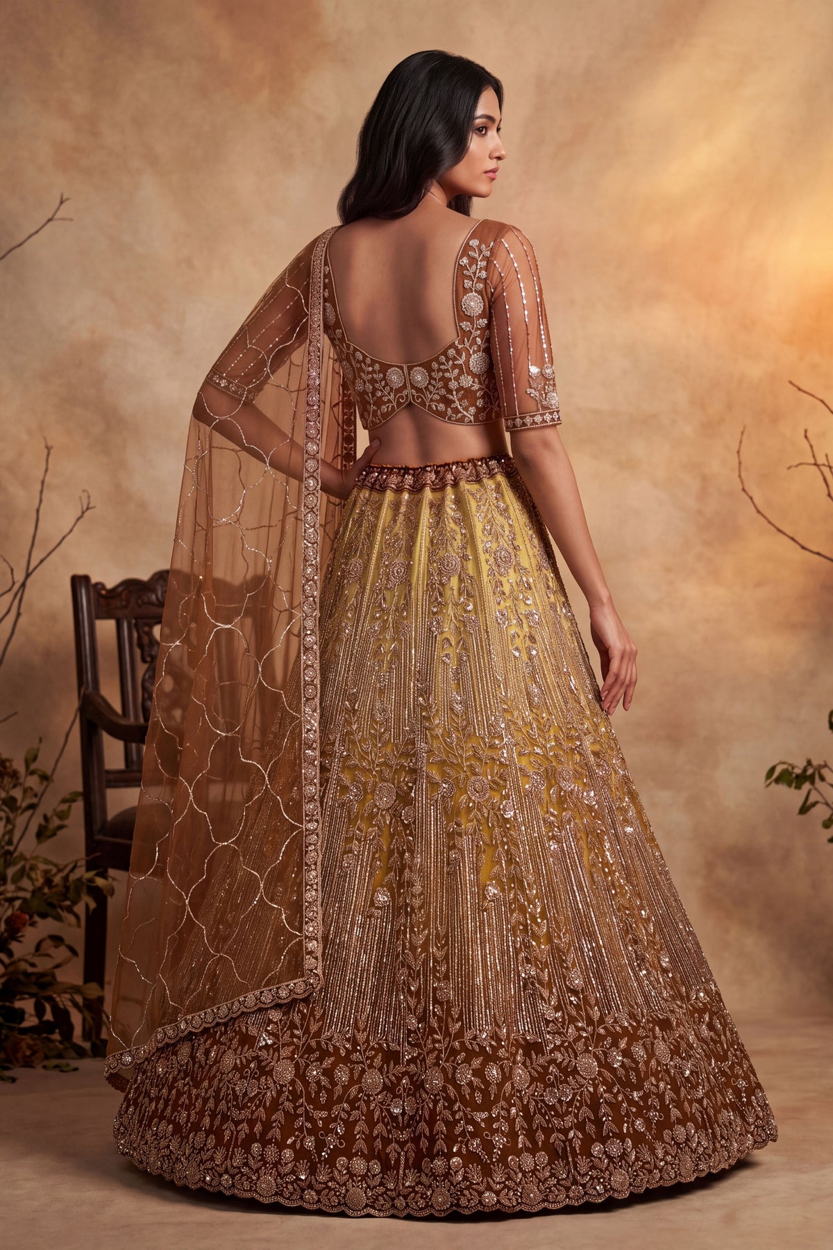 Charming Rust Orange Net Heavy Embroidered Designer Lehenga Choli with Dupatta