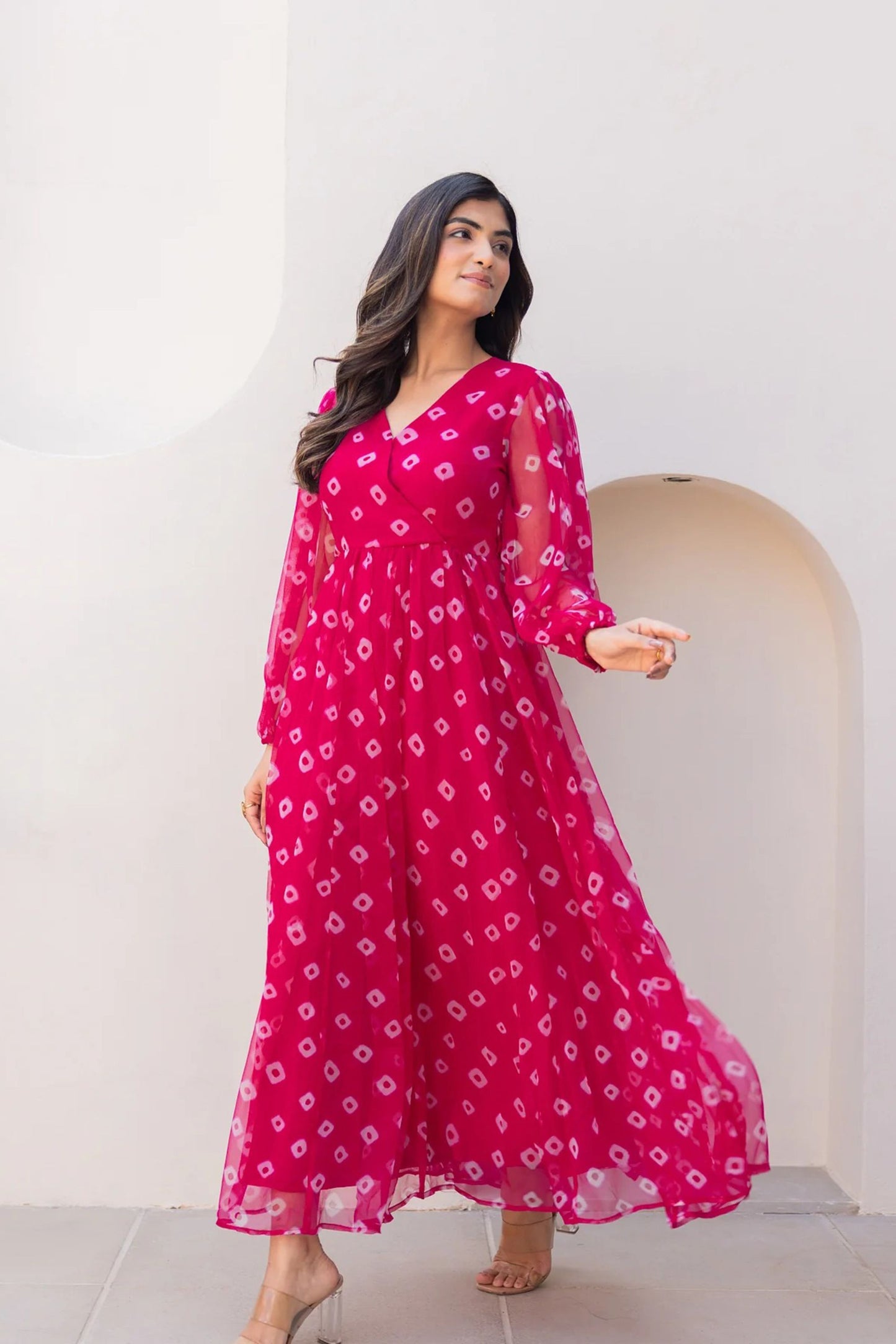 Lovely Pink Bandhani Print Georgette Gown with Sheer Sleeves and V-Neckline