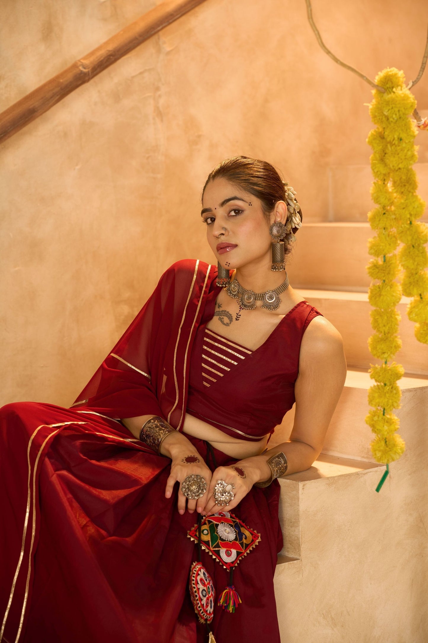 Maroon Silk Navratri Lehenga Choli with Gold Zari Border and Sleeveless Blouse