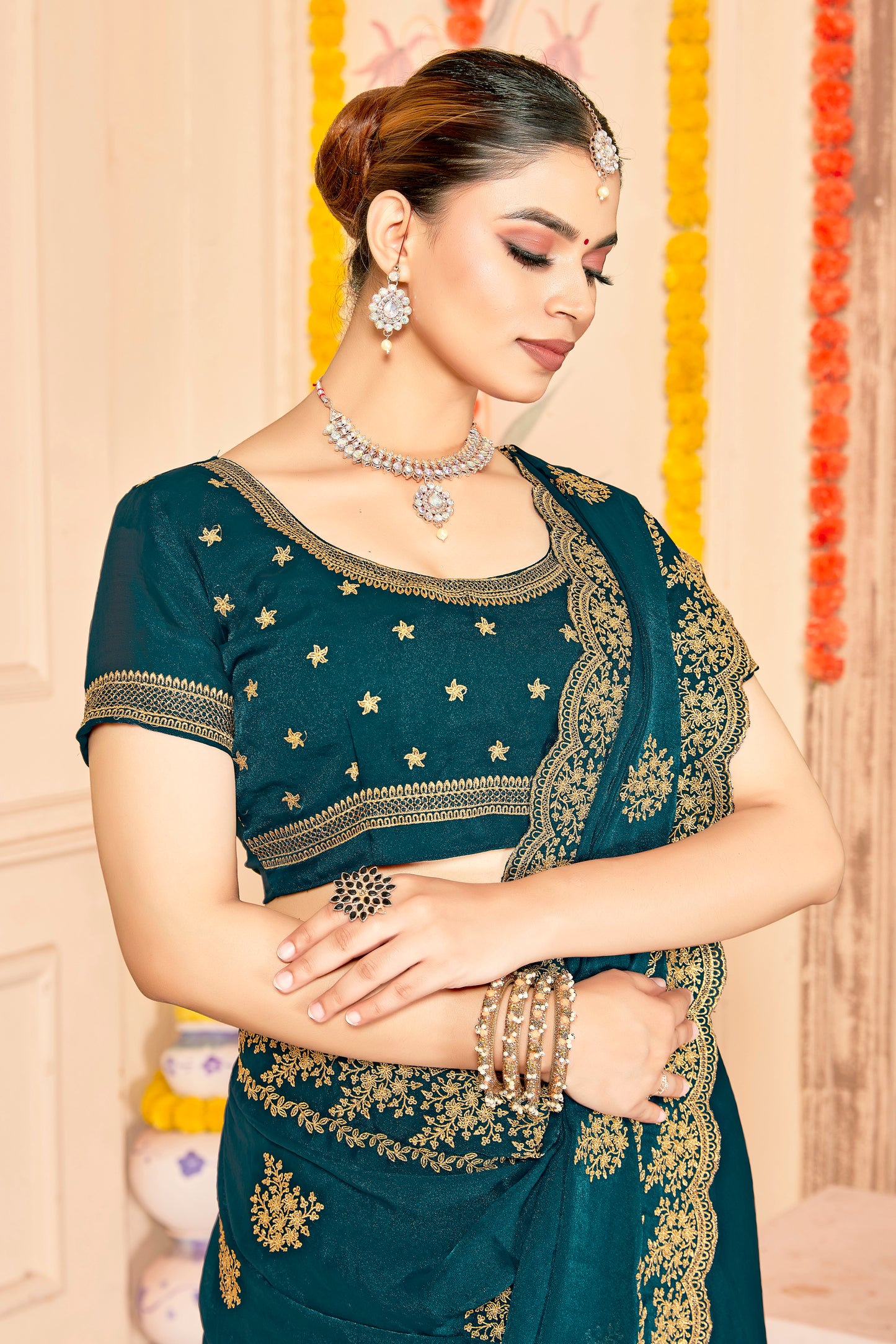 Elegant Teal Green  Saree with Golden Designer Blouse