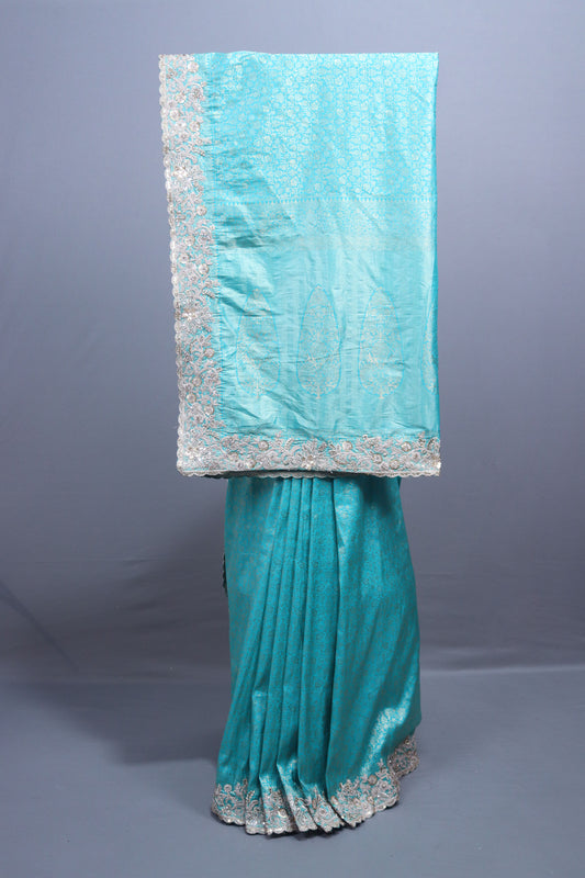 Turquoise Blue Silk Saree with Silver Zari Embroidered Lace Border