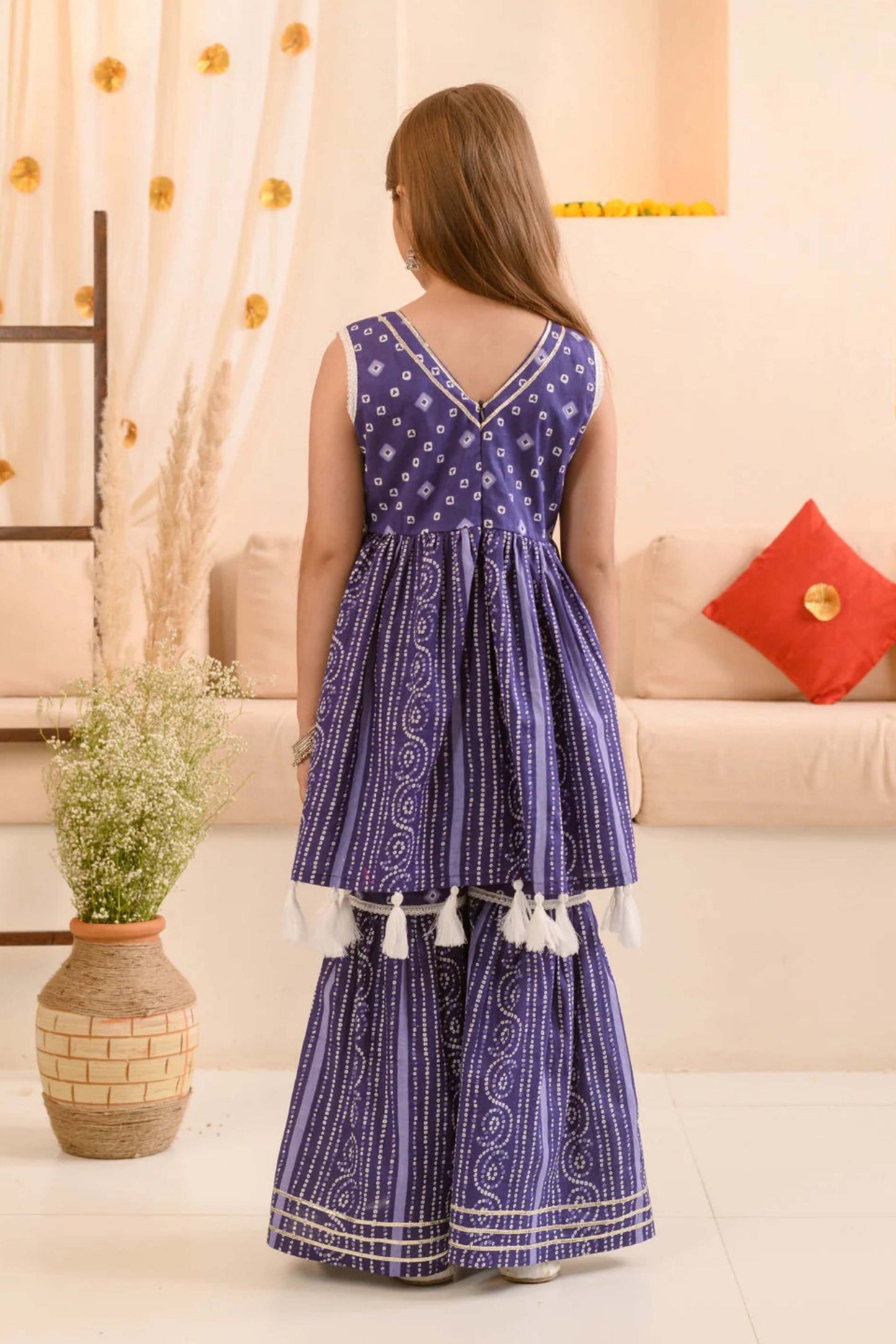 Trendy Purple Bandhani Print Girls Sharara Set with Tassel Detailing