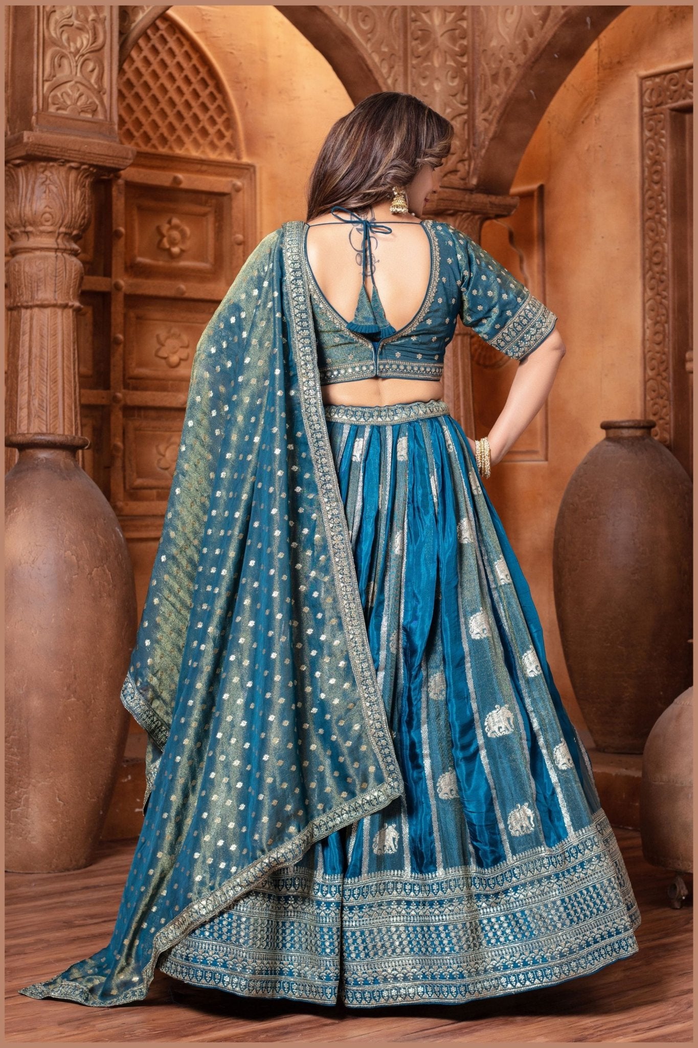 Banarasi Tissue Pleated Teal Blue Lehenga with Floral Woven Motifs - Mangaldeep NX