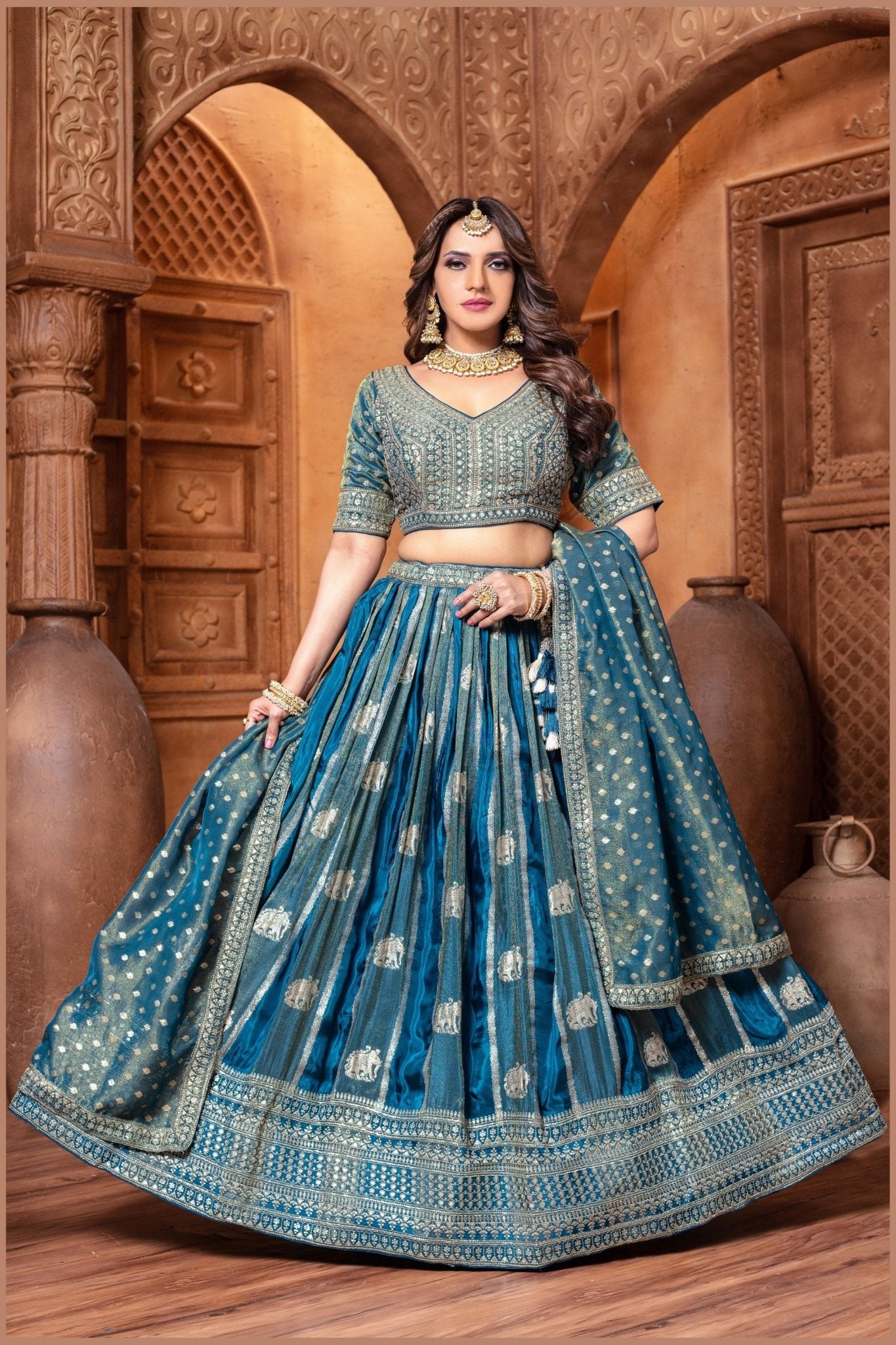 Banarasi Tissue Pleated Teal Blue Lehenga with Floral Woven Motifs - Mangaldeep NX