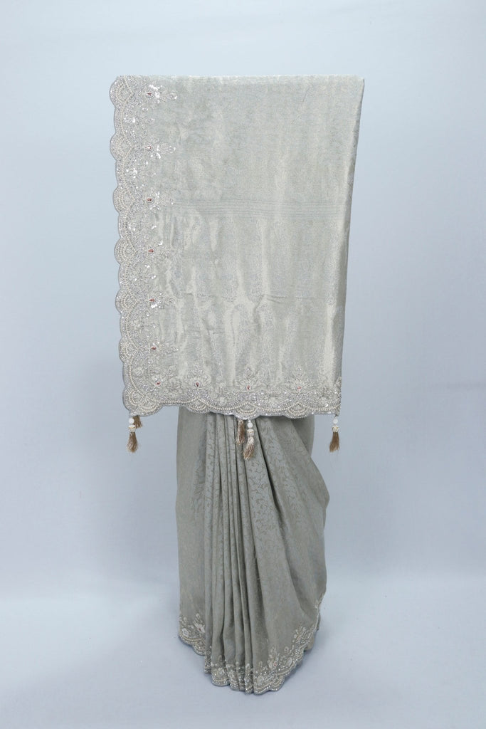 Elegant Silver Grey Banarasi Saree with Heavy Embroidered Border and Tassel Detailing - Mangaldeep NX
