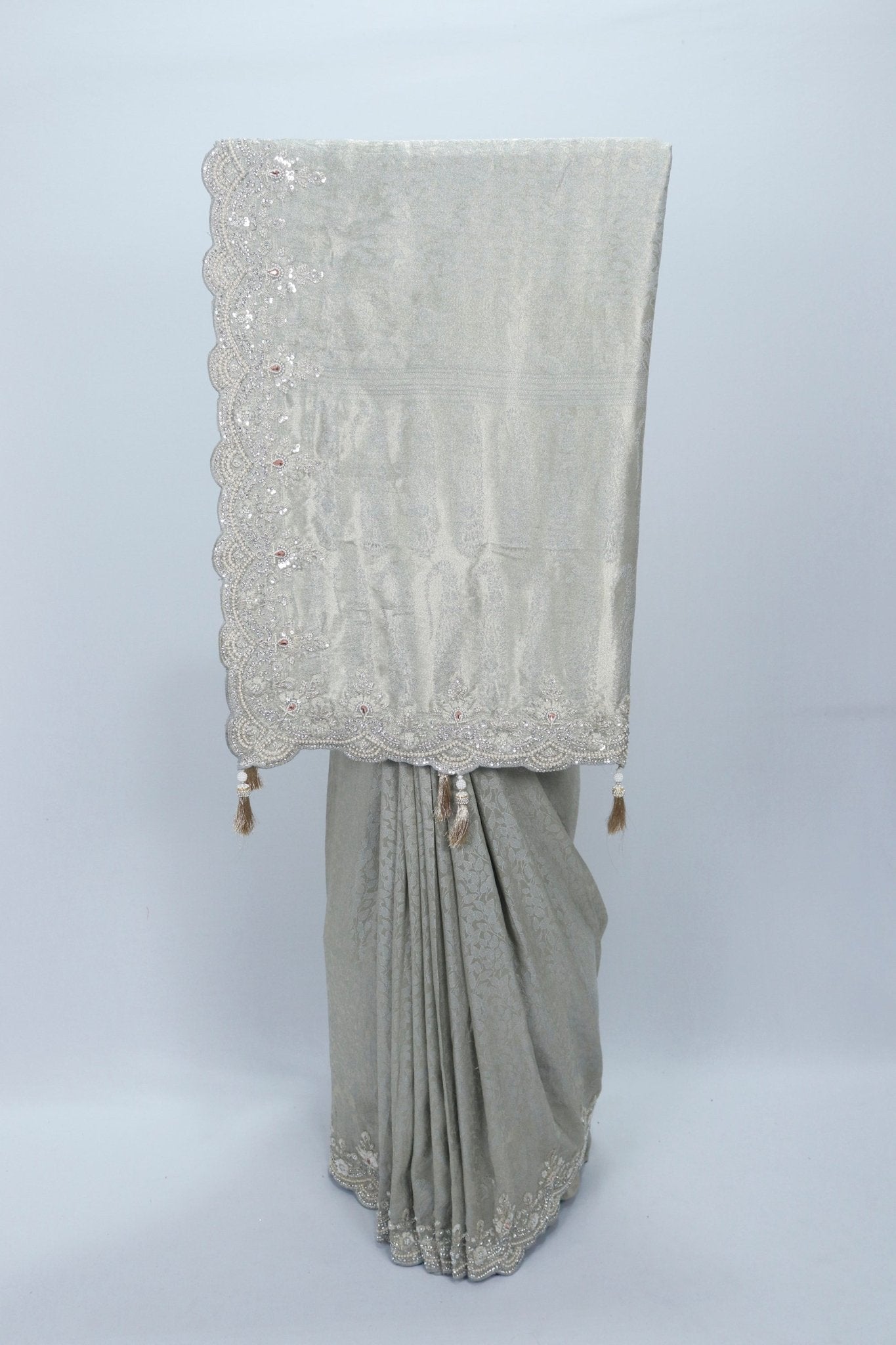 Elegant Silver Grey Banarasi Saree with Heavy Embroidered Border and Tassel Detailing - Mangaldeep NX