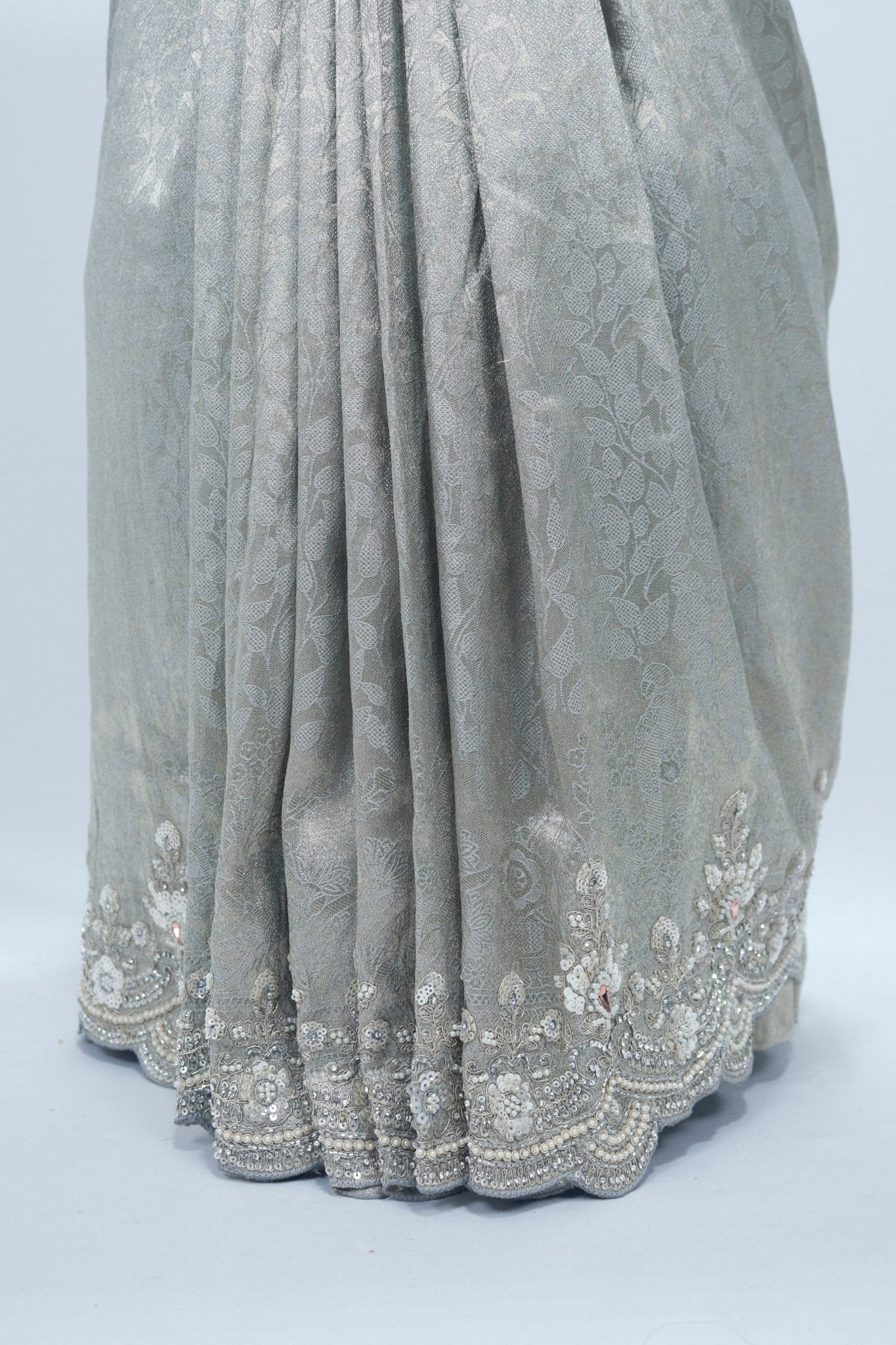 Elegant Silver Grey Banarasi Saree with Heavy Embroidered Border and Tassel Detailing - Mangaldeep NX