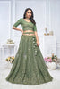 Green Embroidered Net Lehenga Choli with Peacock Motifs and Sequins Dupatta - Mangaldeep NX