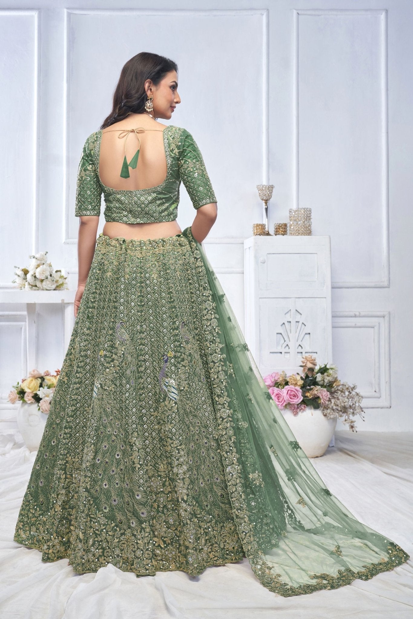 Green Embroidered Net Lehenga Choli with Peacock Motifs and Sequins Dupatta - Mangaldeep NX
